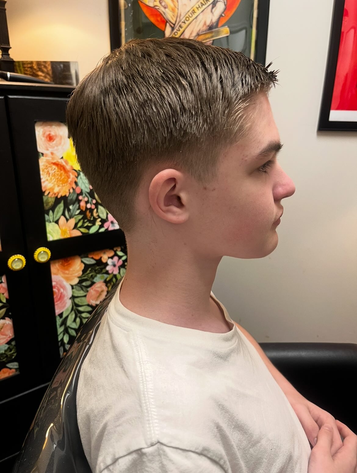 Sleek Textured Comb-Over with Precision Fade