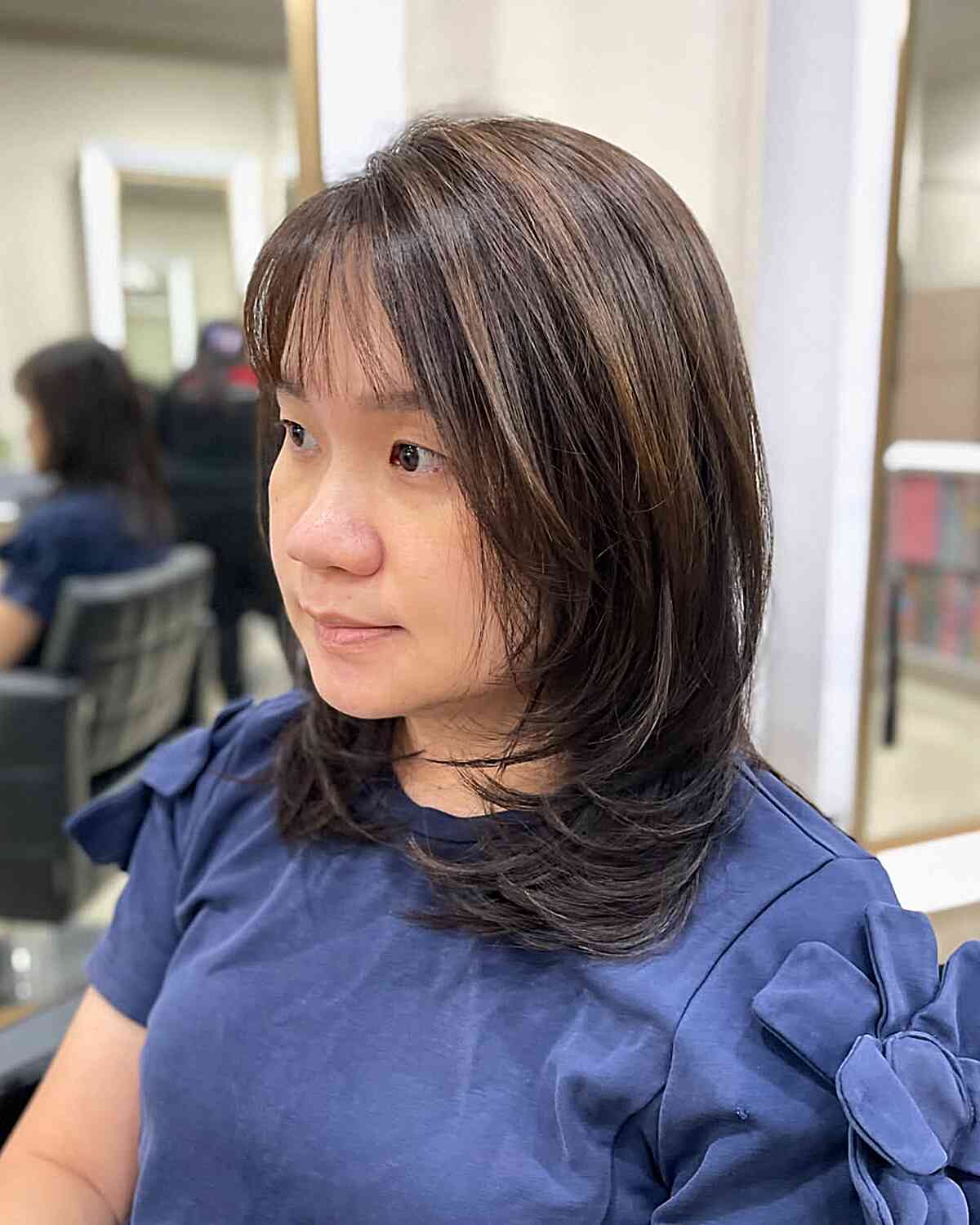 Soft Layered Medium-Length Cut with Face-Framing Layers