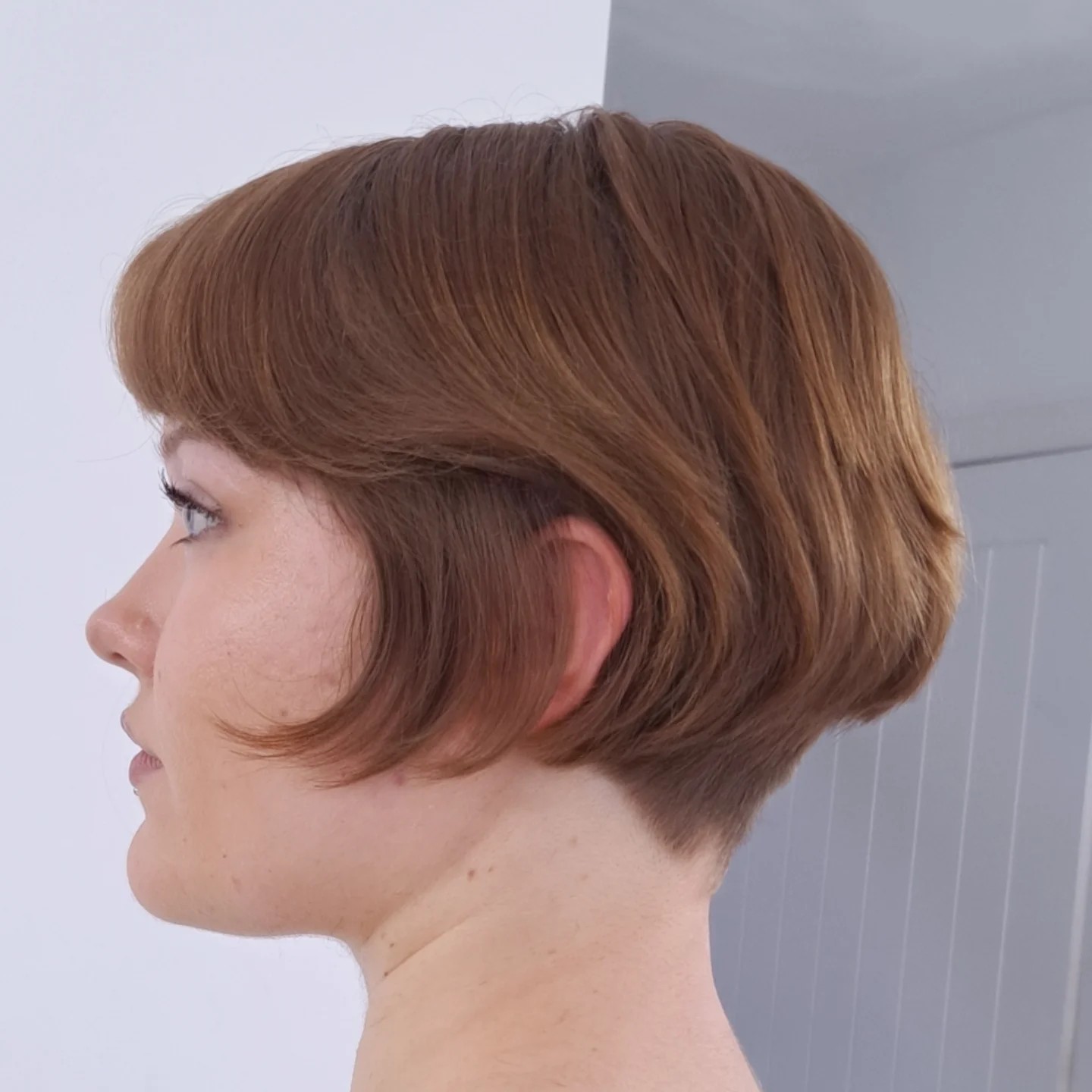 Warm Cinnamon Swirl Bob with Curved Fringe