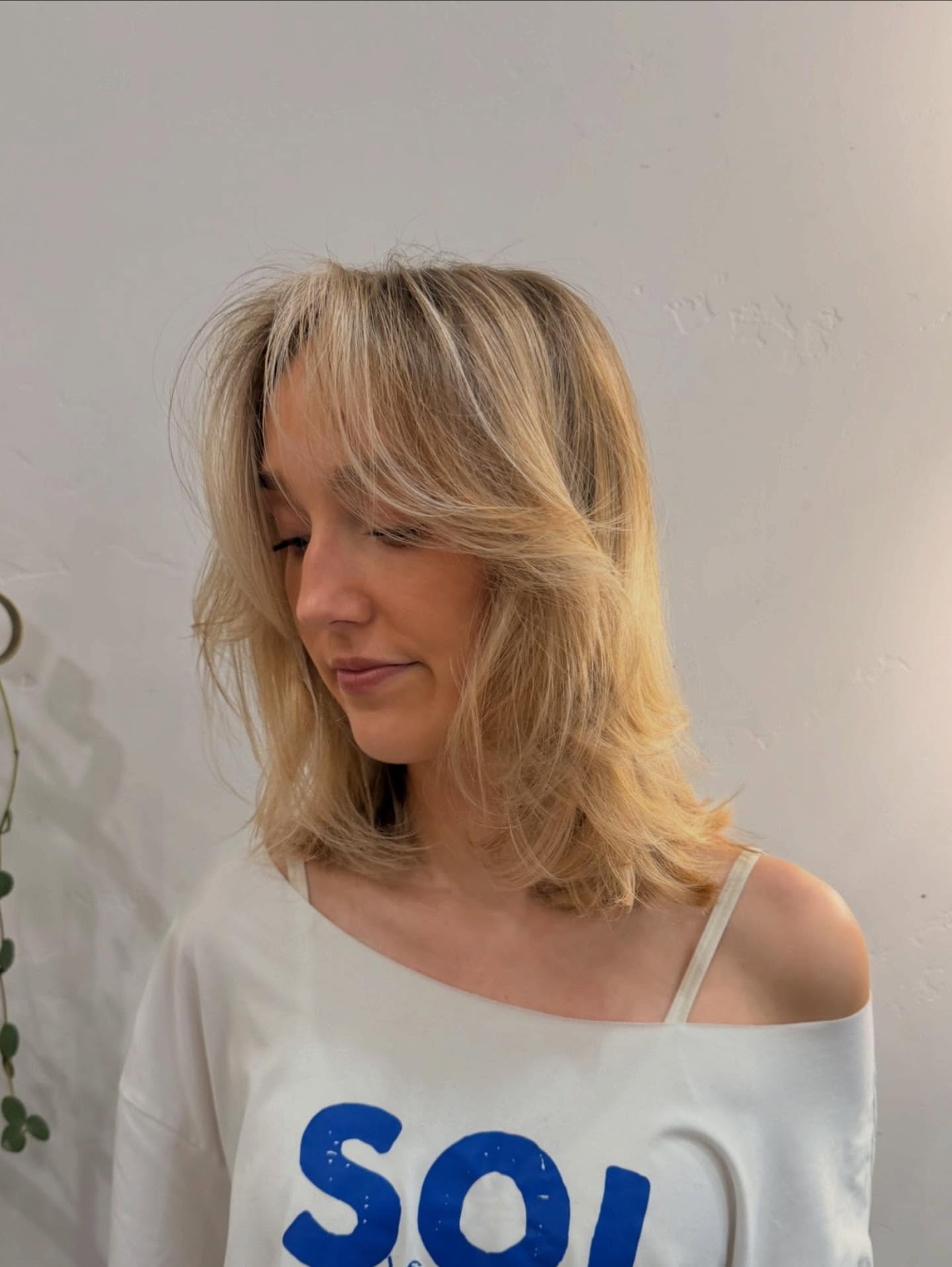 Fluffy Layered Lob with Gentle Face-Framing Layers