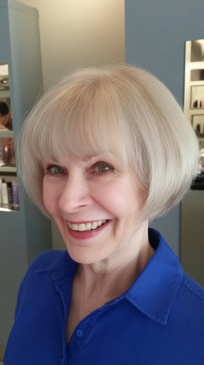 Elegant Rounded Bob with Soft Wispy Bangs