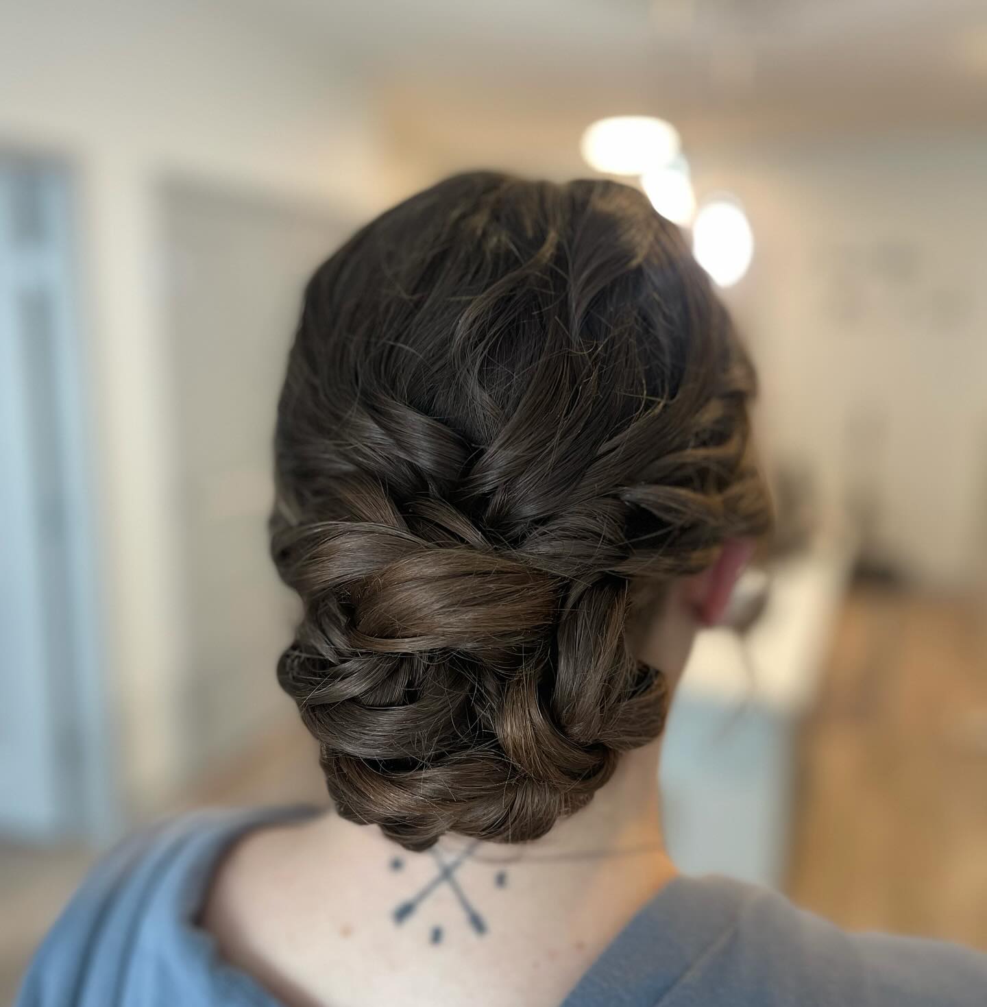 Elegant Textured Low Braid Bun