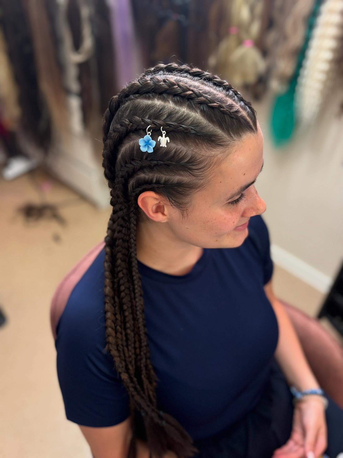 Intricate Cornrow Braids with Decorative Accessories