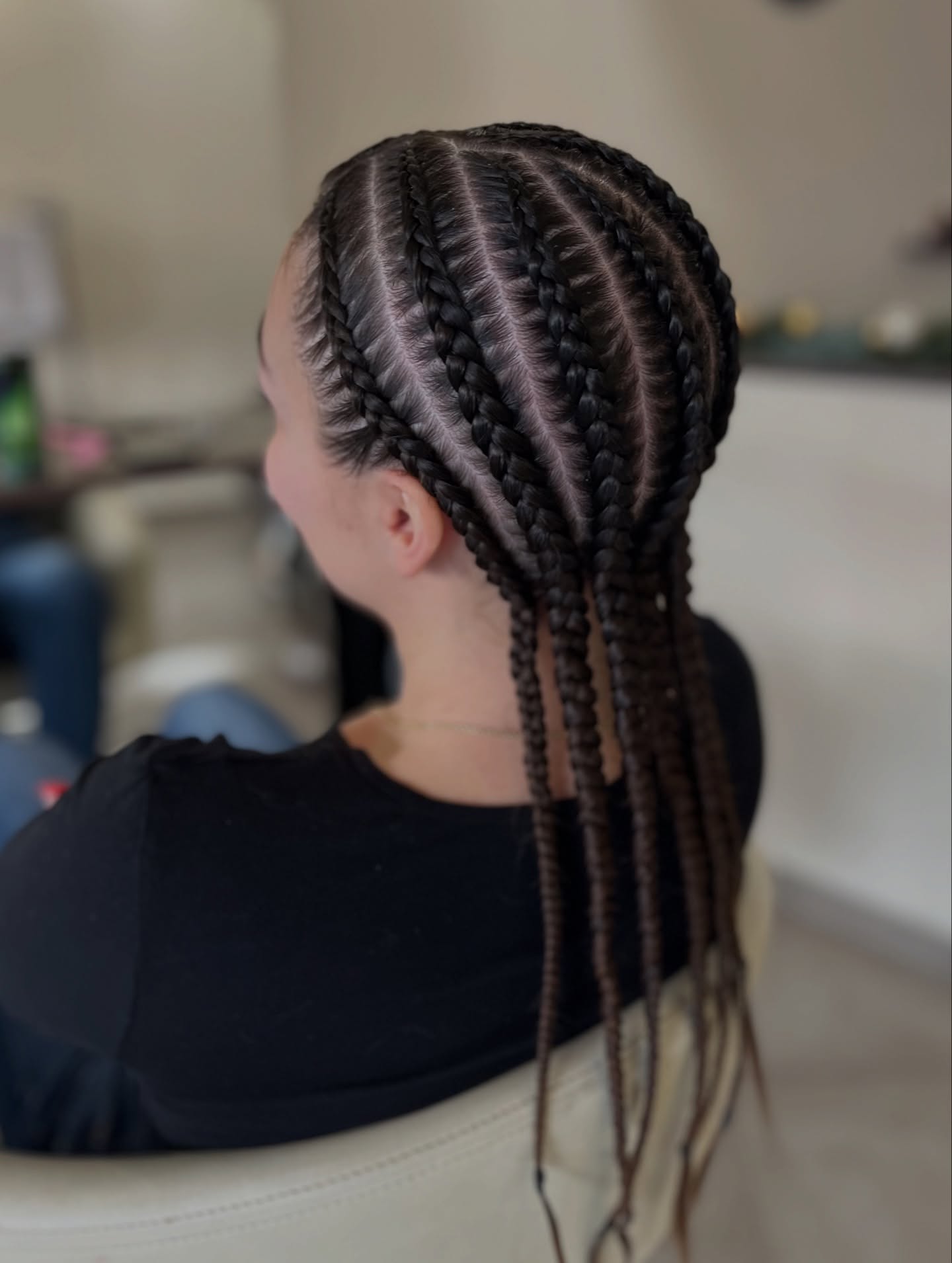 Intricate Cornrow Braids with Flowing Extensions