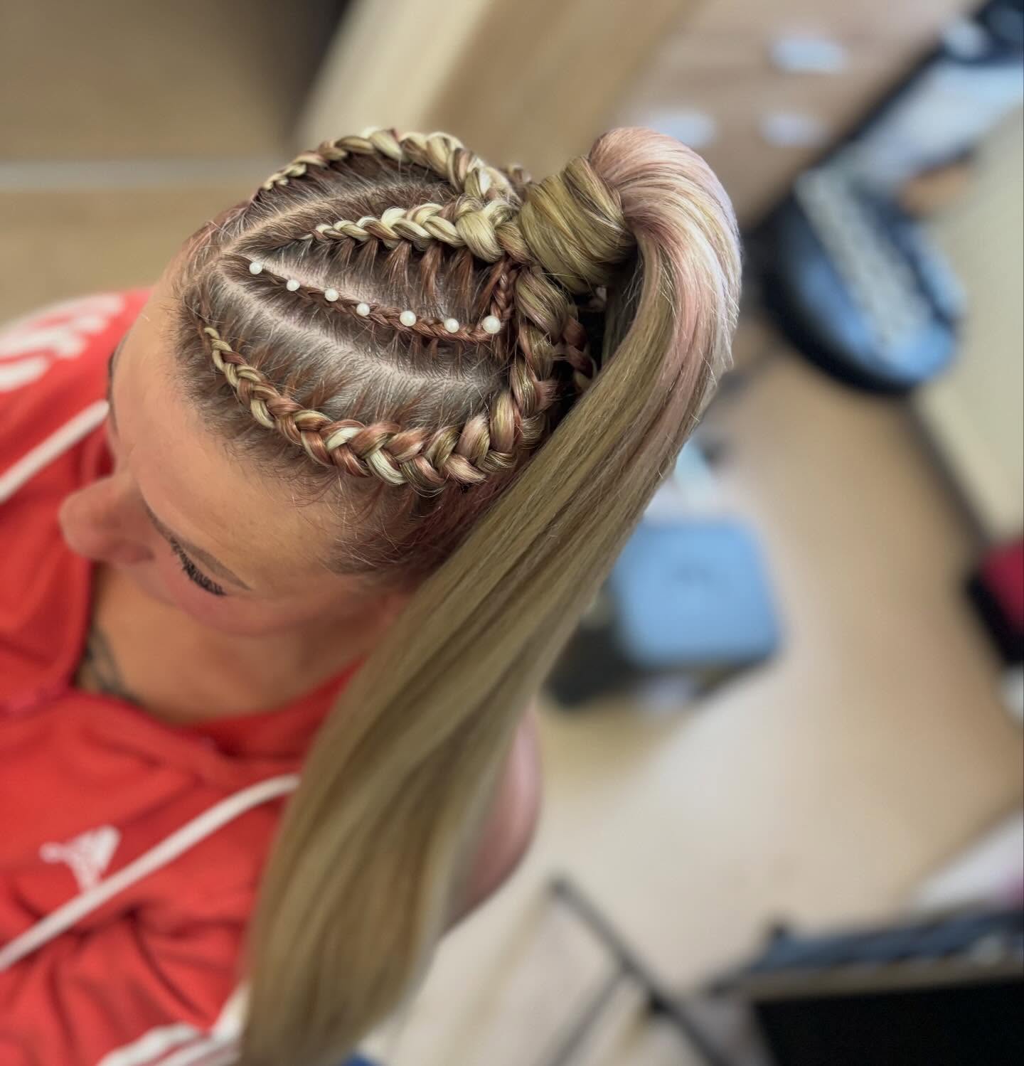 Modern High Ponytail with Intricate Braided Crown