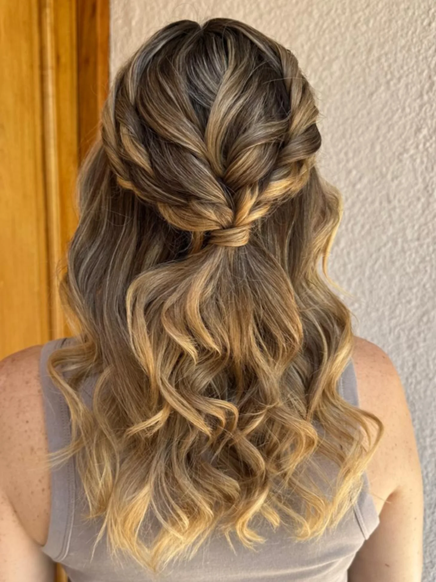 Softly Twisted Half-Up Braid with Loose Waves