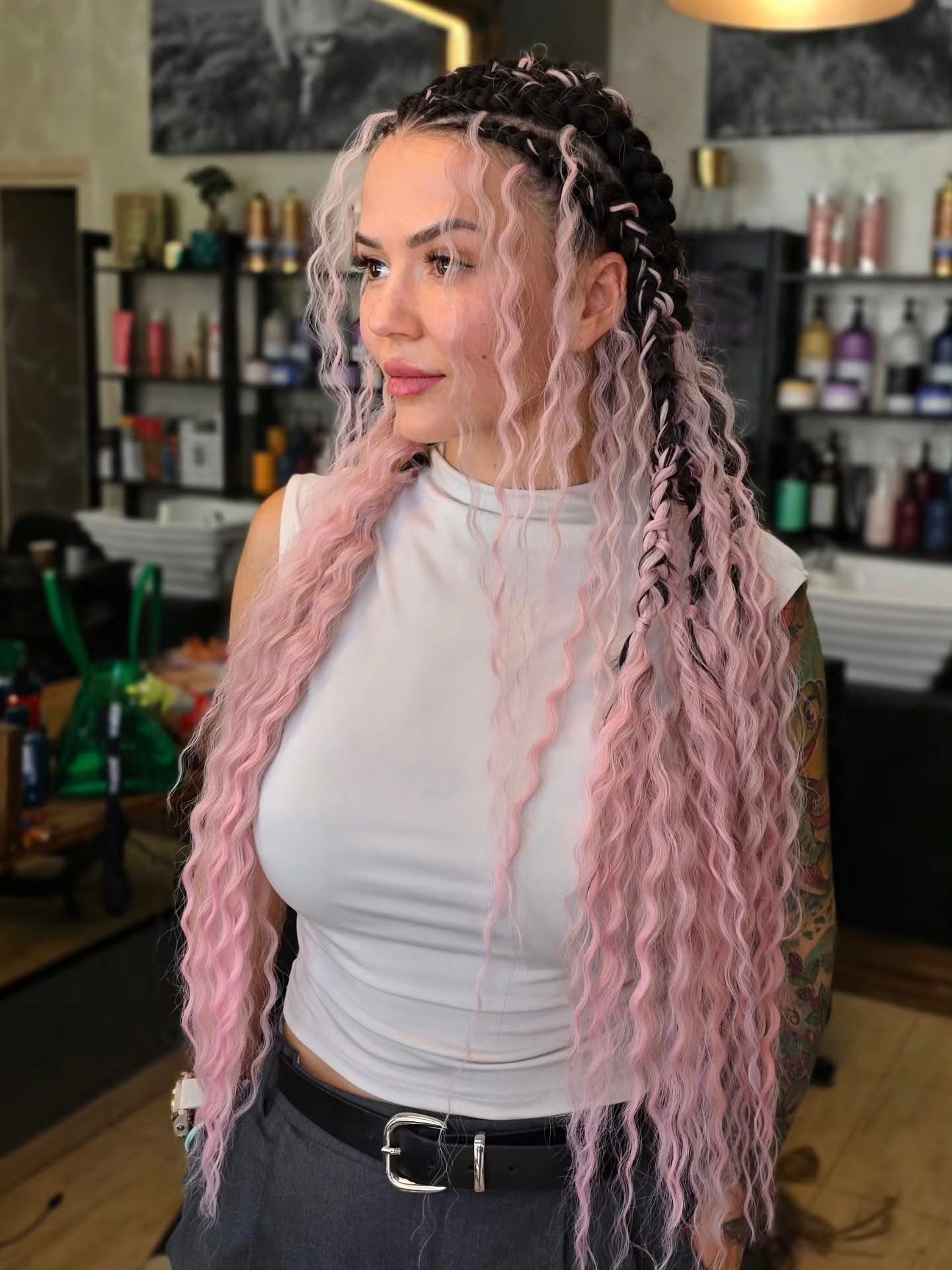 Trendy Braided Hairstyle with Pastel Pink Waves