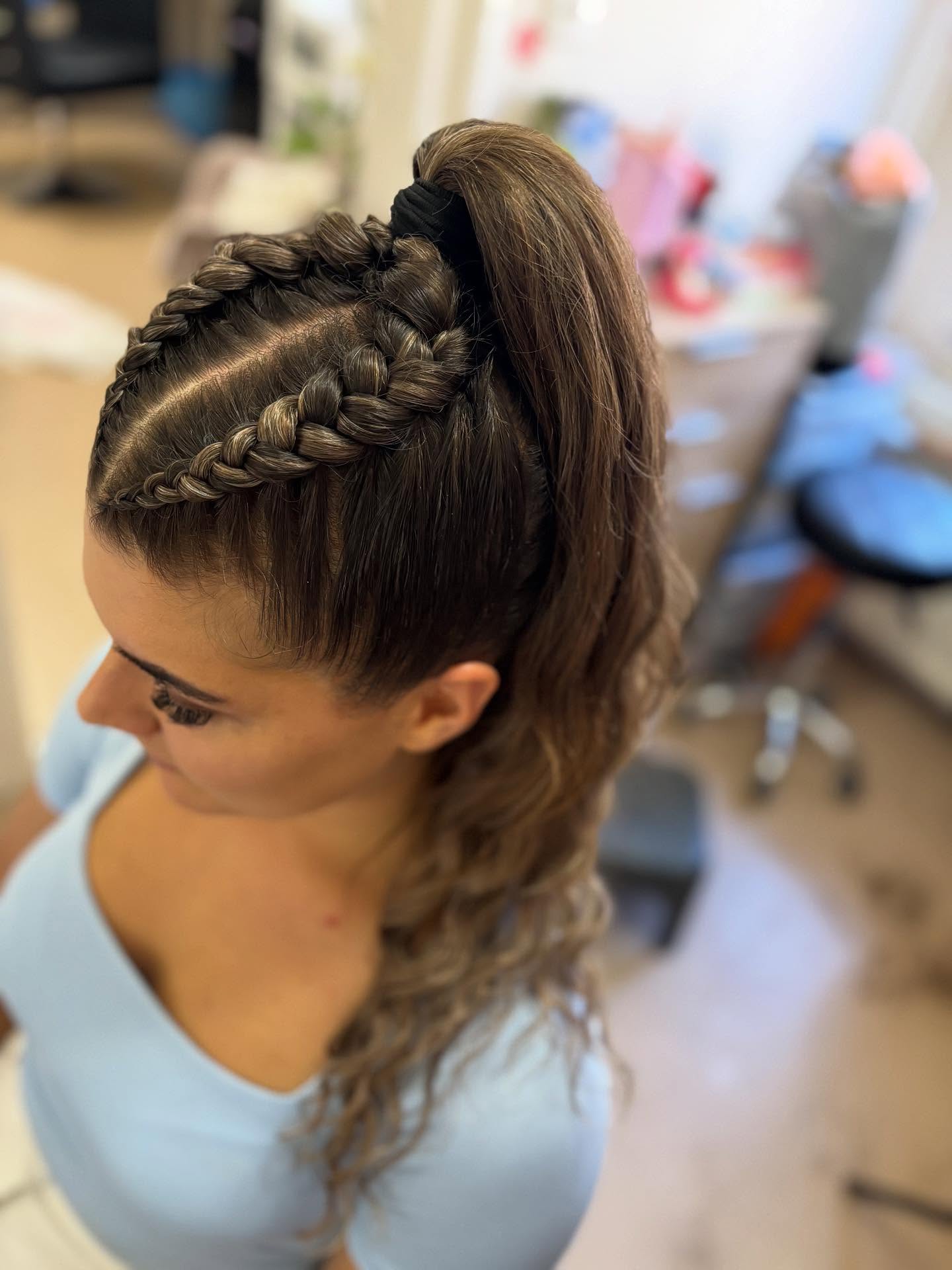 Trendy High Braided Ponytail with Curly Accents