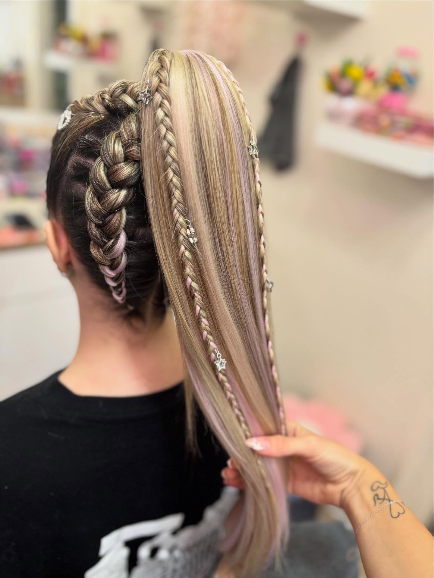 Trendy High Ponytail with Intricate Side Braids