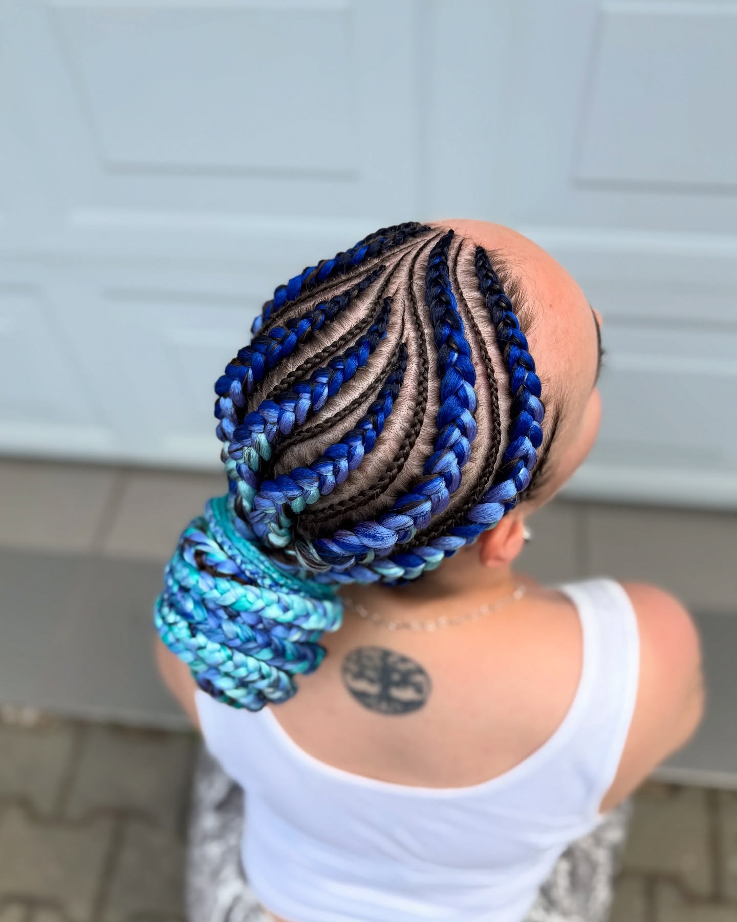 Vibrant Blue and Black Braided Updo