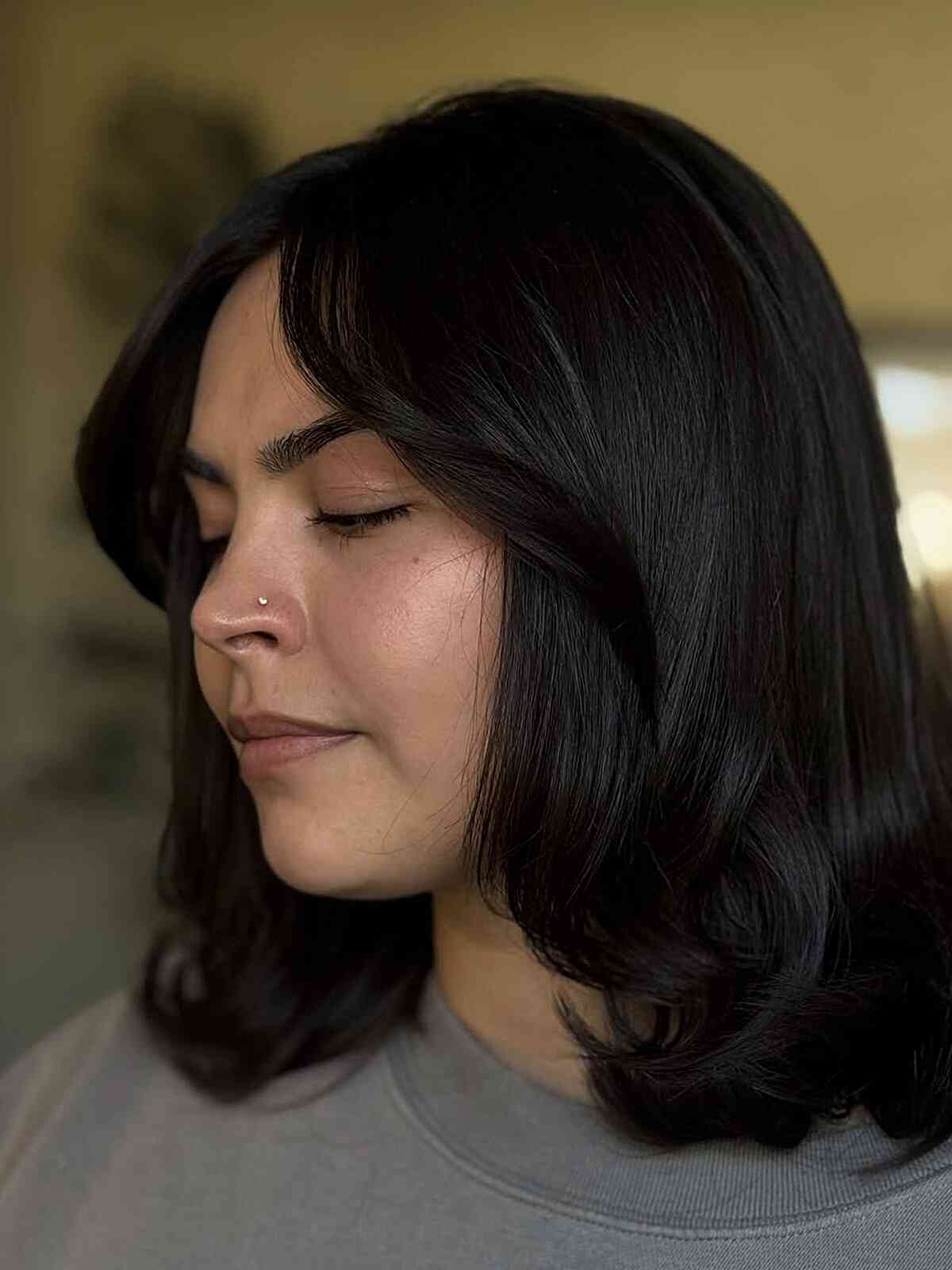 Chic Mid-Length Layered Cut with Soft Waves