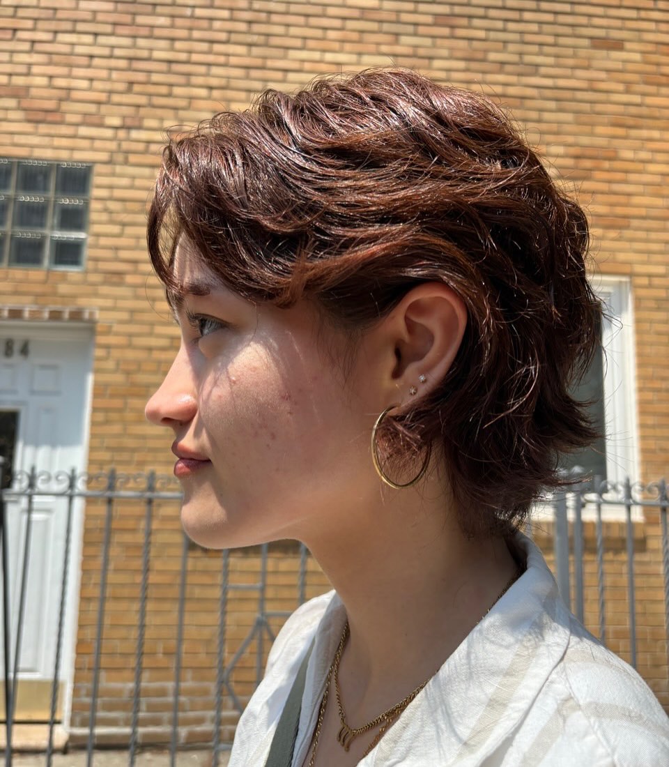 Chic Wavy Bixie with Rich Auburn Highlights
