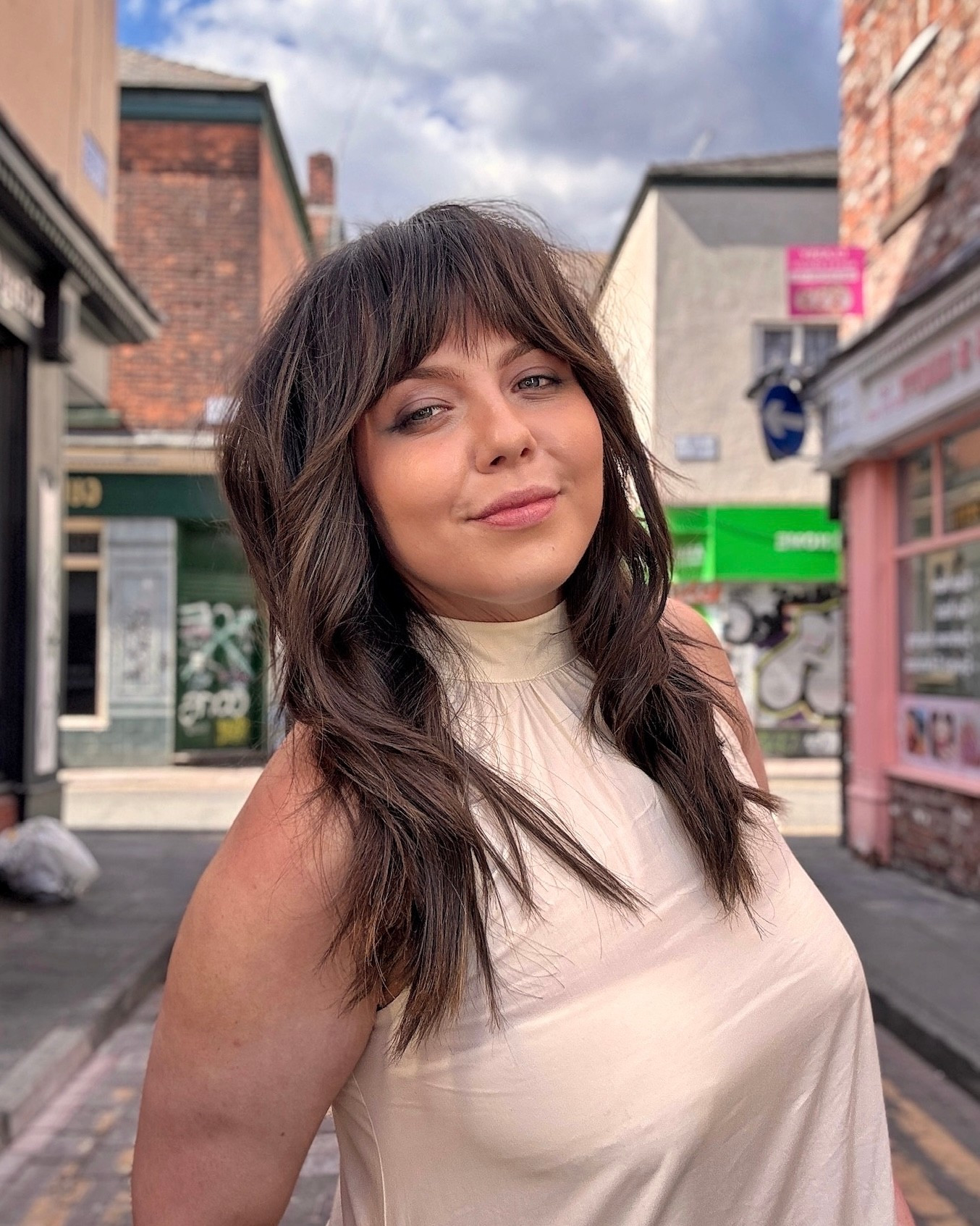 Effortless Chocolate-Brown Shoulder-Length Layered Cut with Face-Framing Bangs and Soft Waves