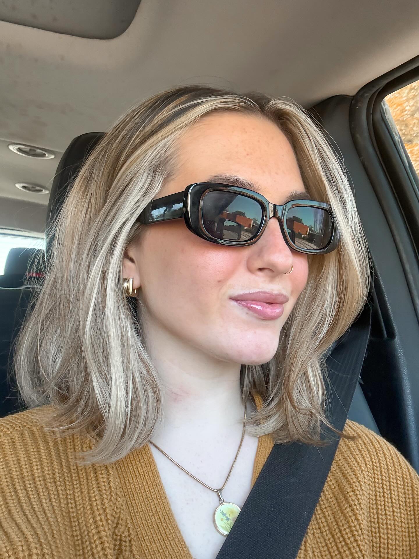 Ivory-Blonde Shoulder-Length Lob with Soft Side-Swept Face-Framing Layers