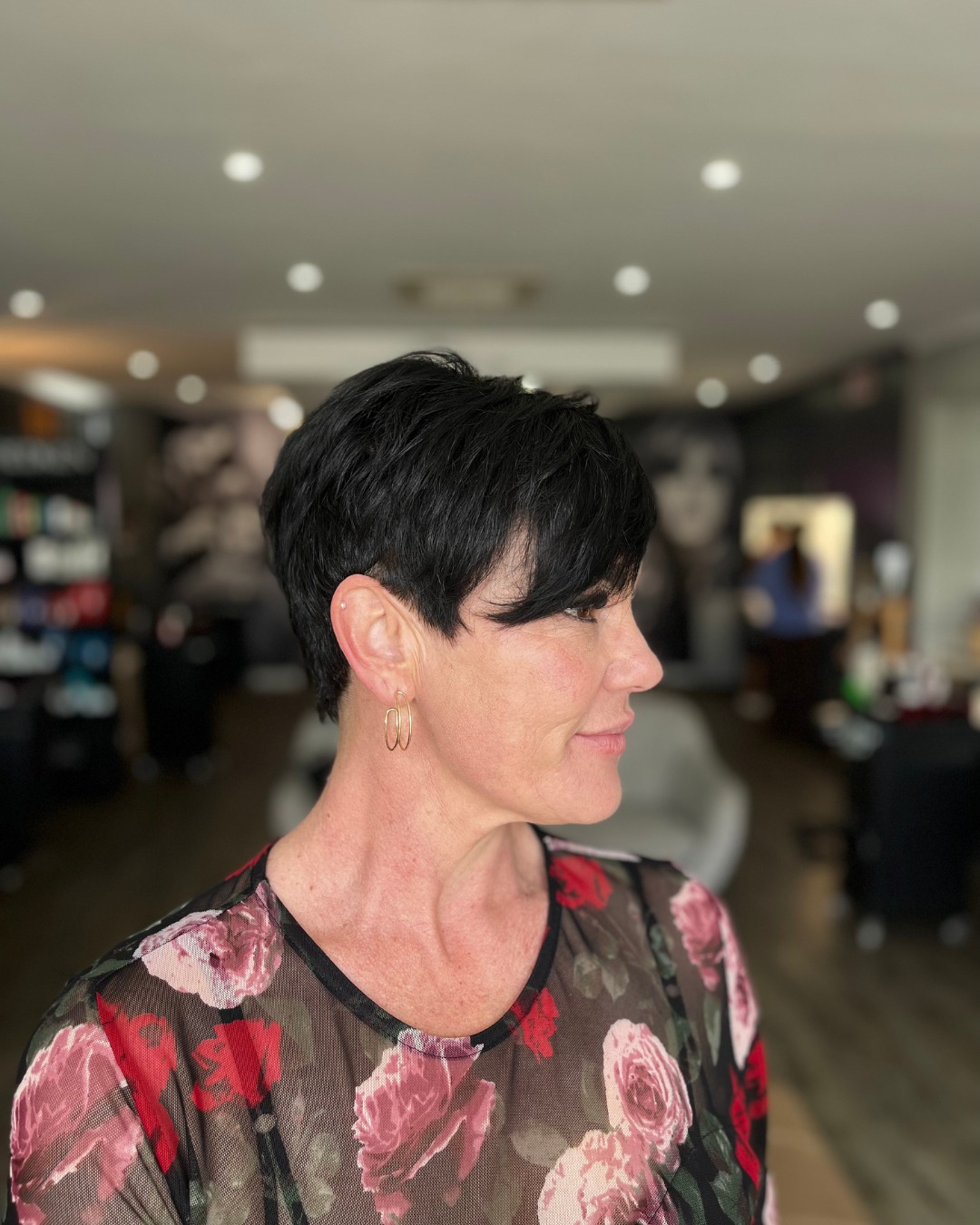 Sleek Black Textured Pixie with Side-Swept Fringe