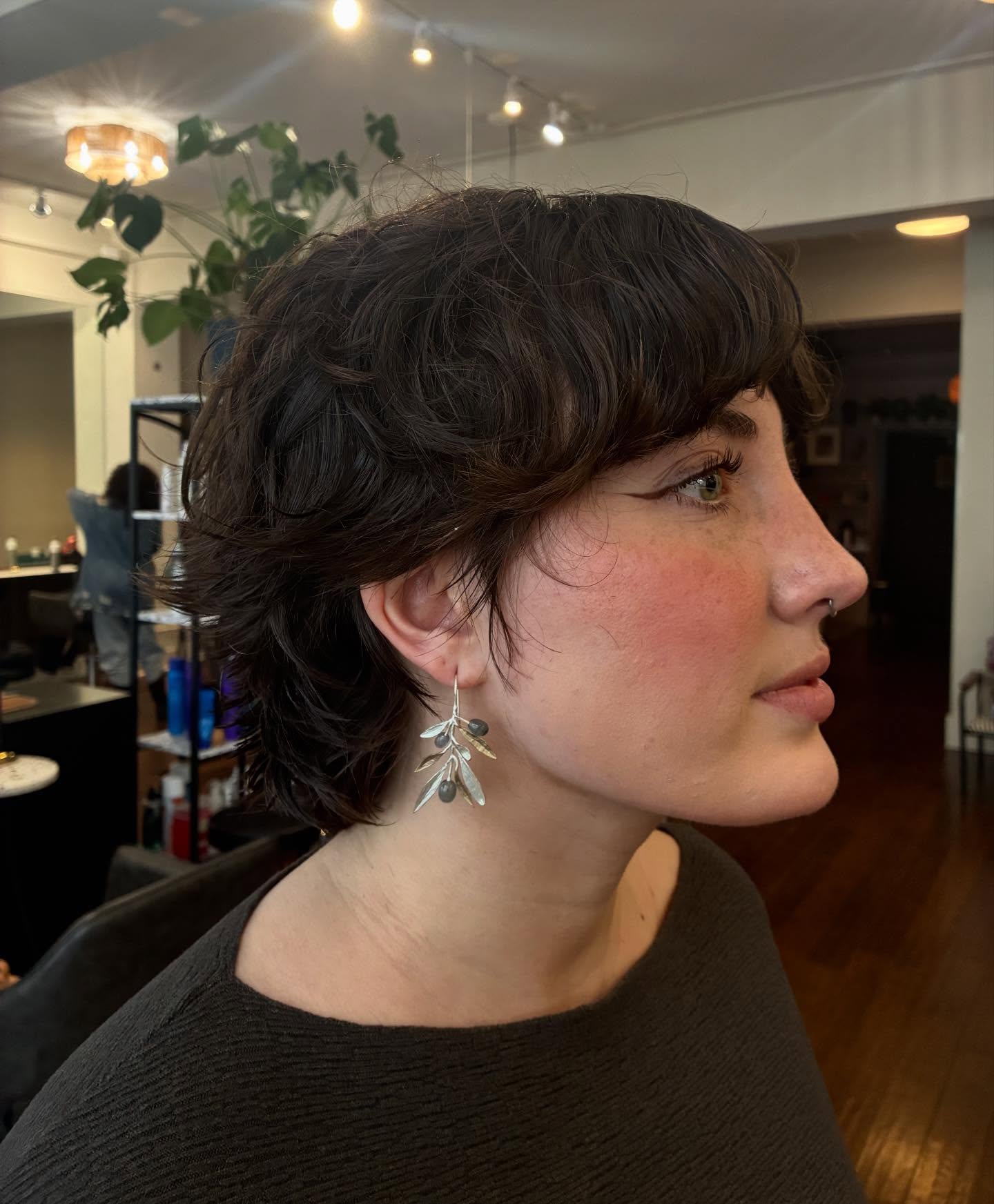 Textured Dark-Brown Short Layered Pixie with Nape-Length Back and Face-Framing Layers