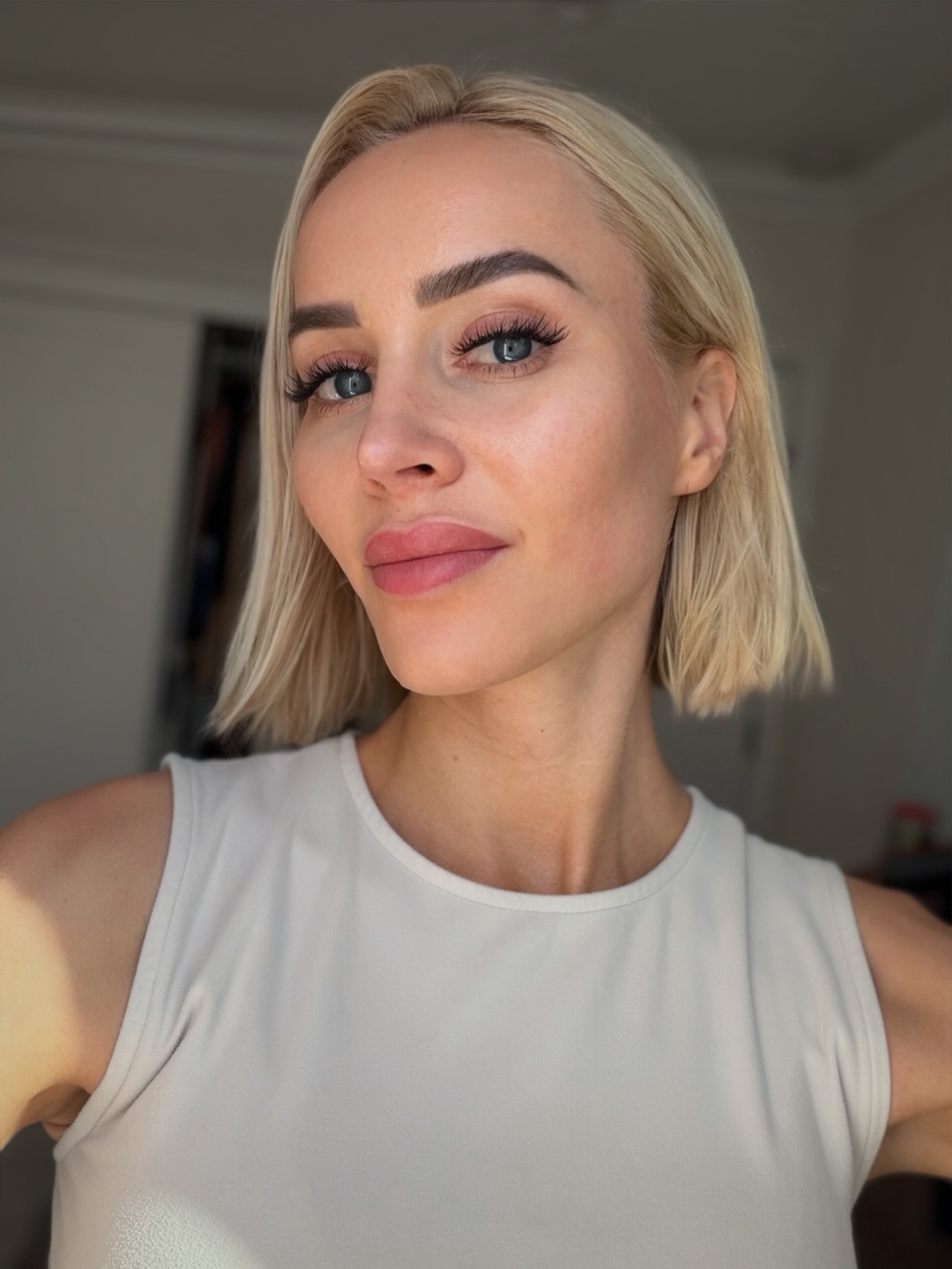 Blunt Chin-Length Cool Blonde Bob with Point-Cut Ends