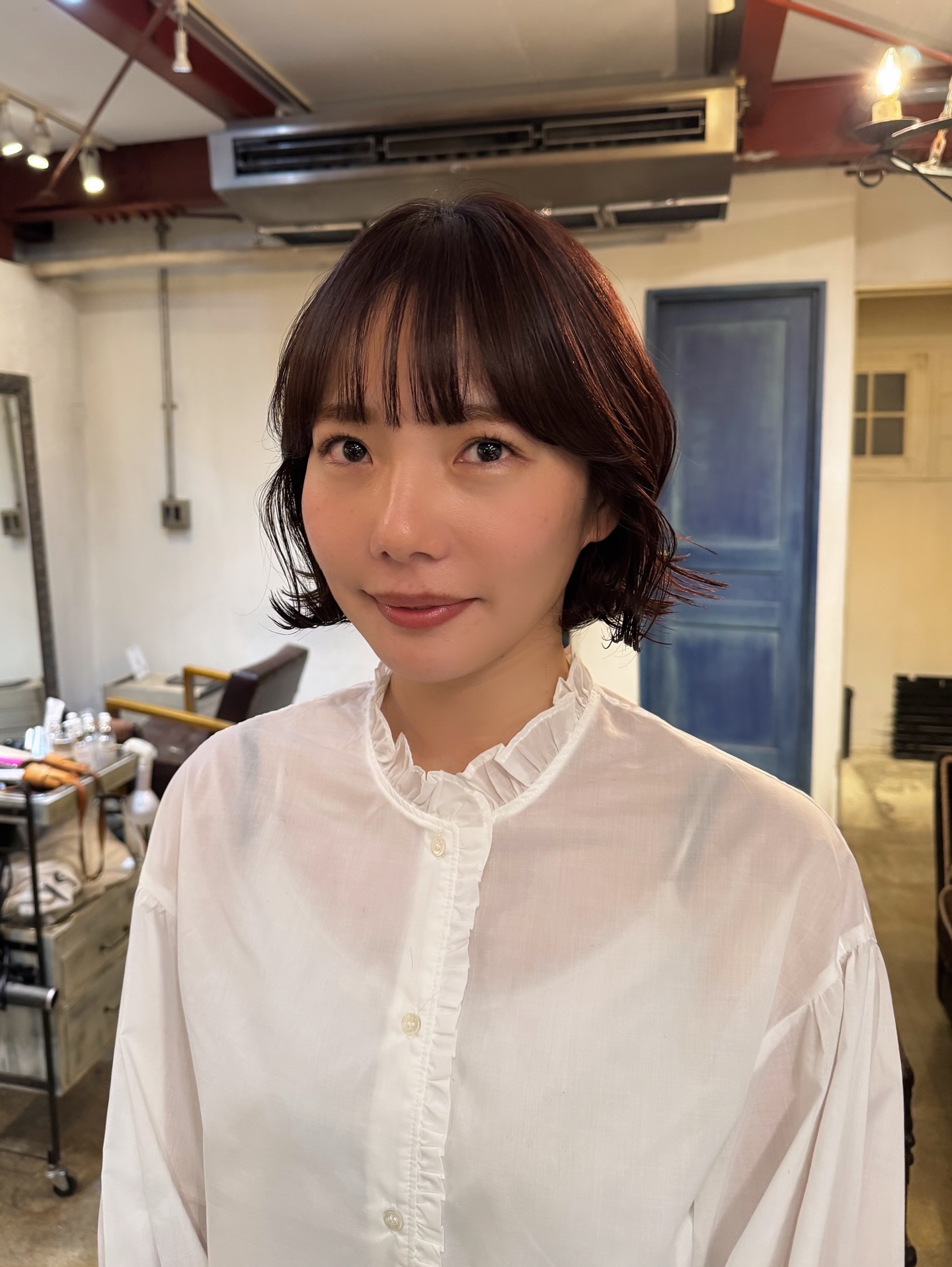 Glossy Chin-Length Wavy Bob with See-Through Micro Fringe