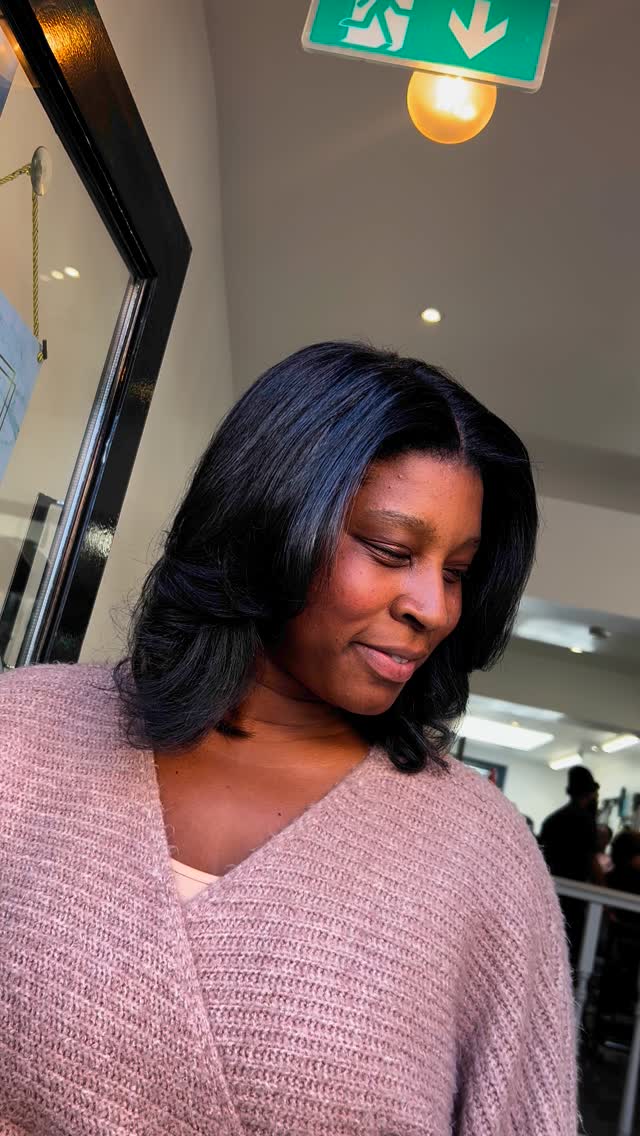 Soft Shoulder-Length Round Brush Blowout with Face-Framing Layers