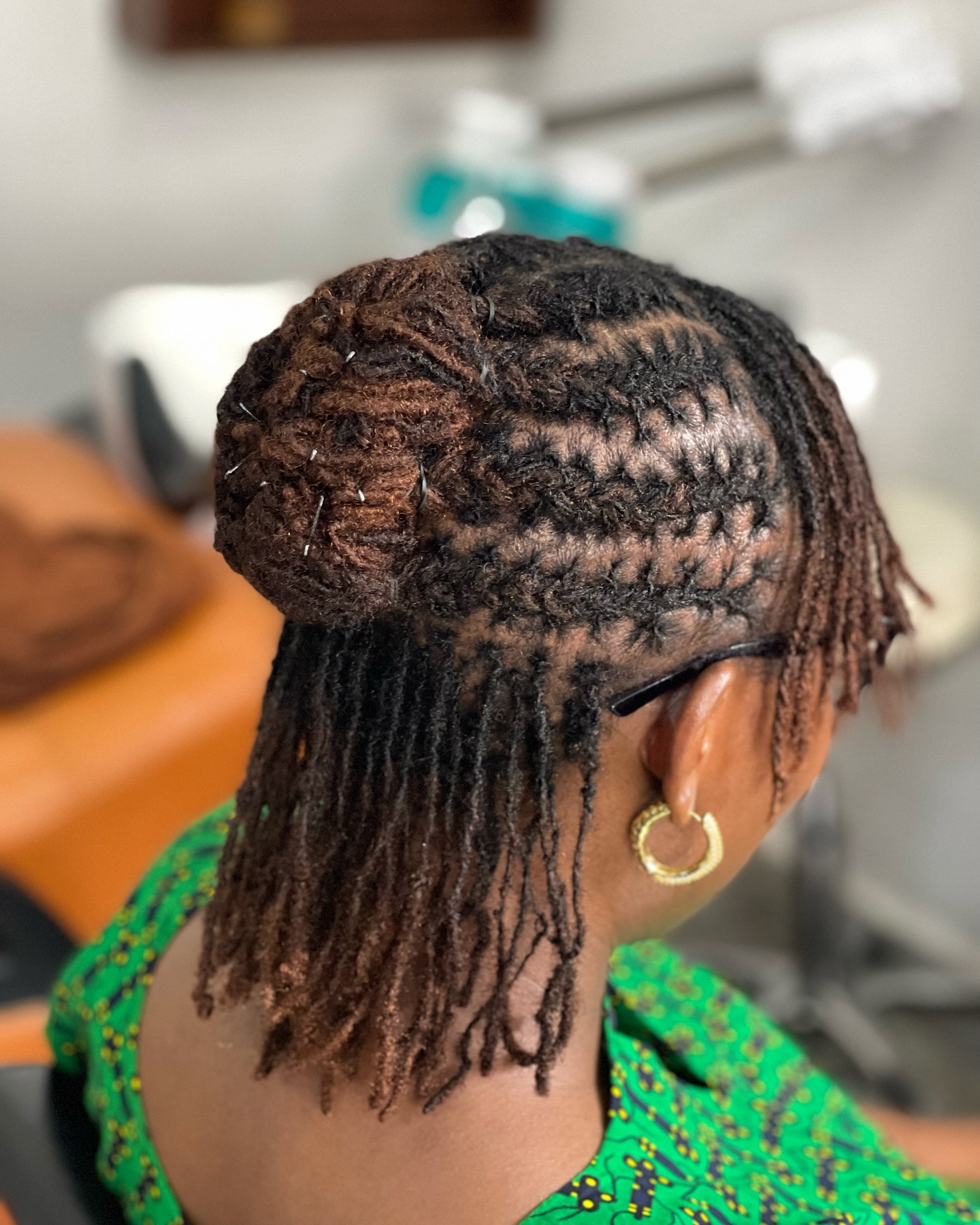 Textured Mini Locs Half-Up Bun with Auburn Tips
