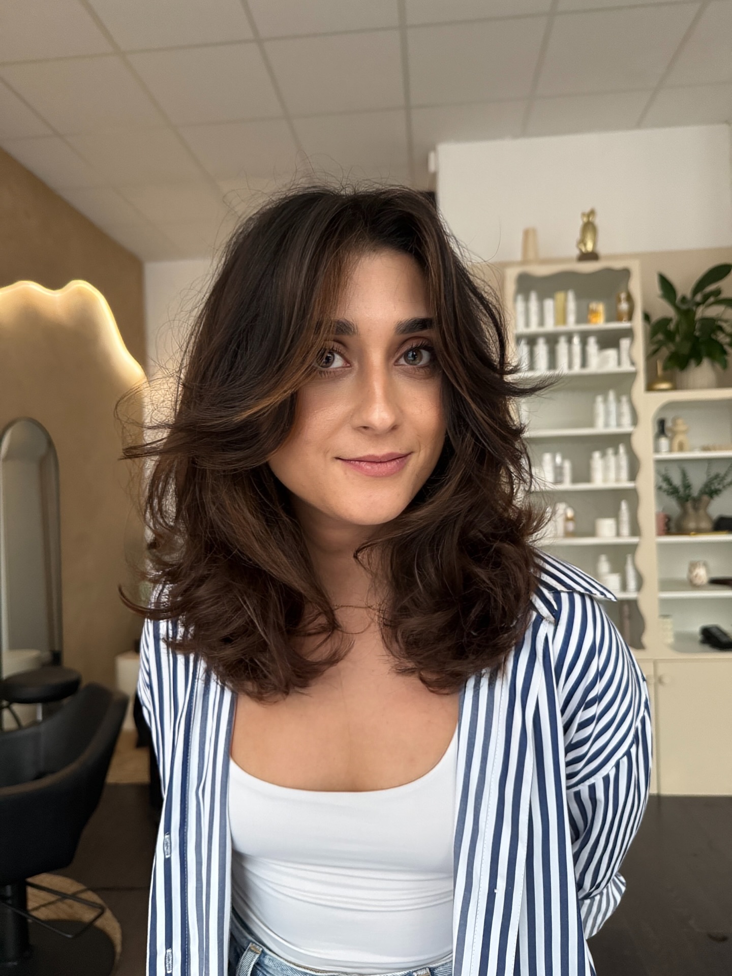Voluminous Brunette Curtain Layers with Mid-Length Flipped Ends