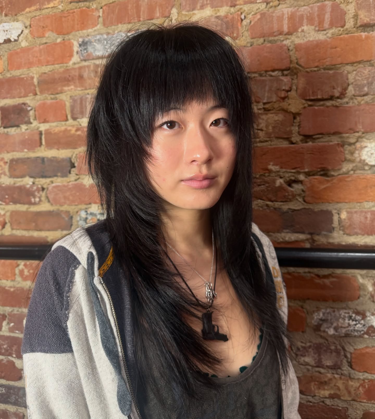 Edgy Long Layered Cut with Textured Bangs