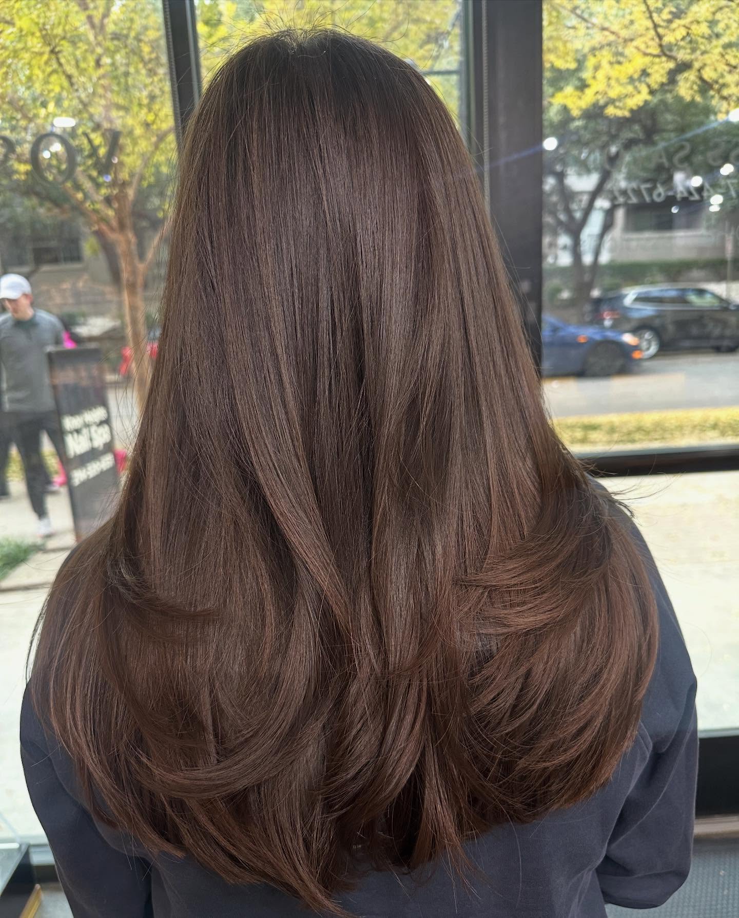 elegant chocolate long layered cut