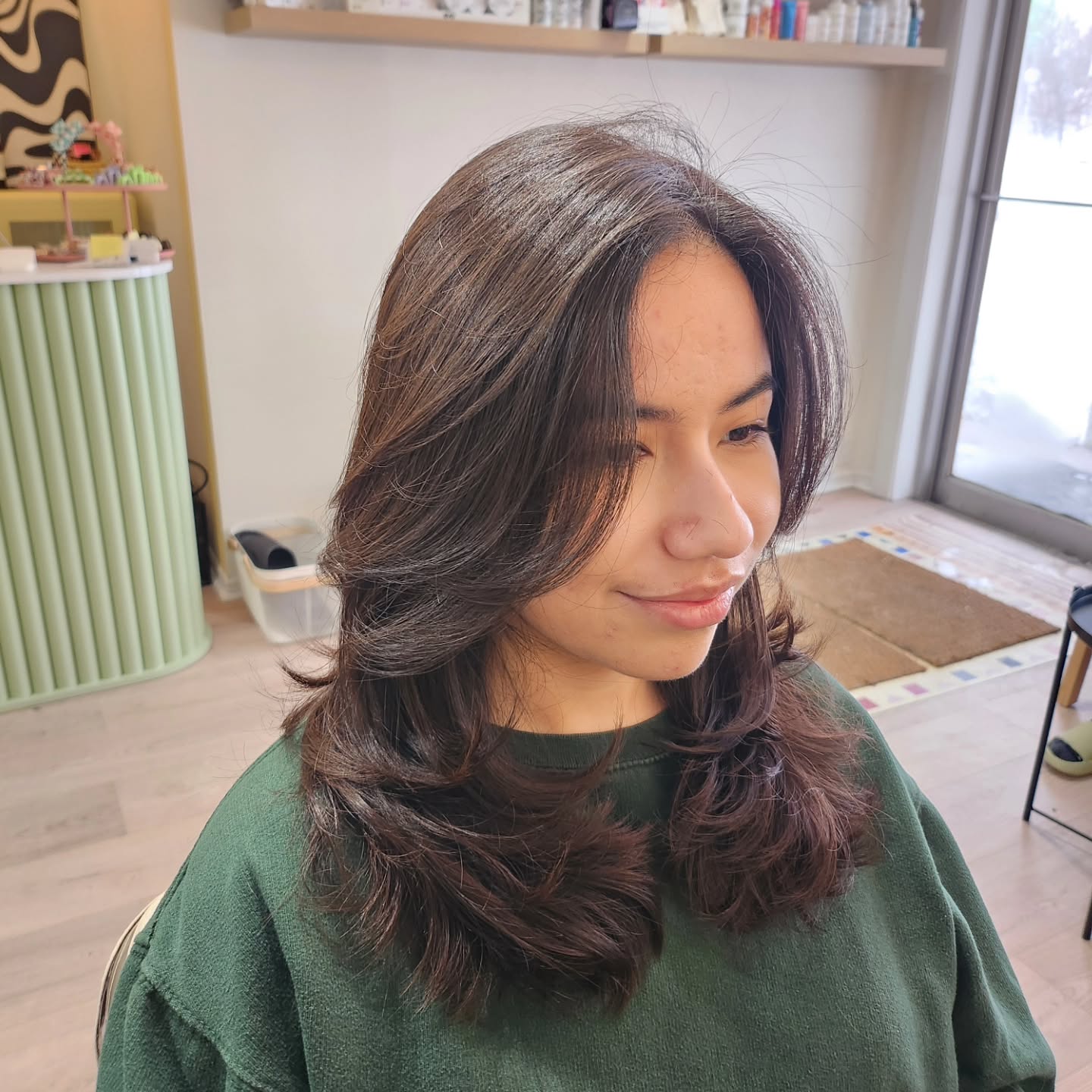 Feathered Medium-Length Cut with Curtain Framing and Underflip