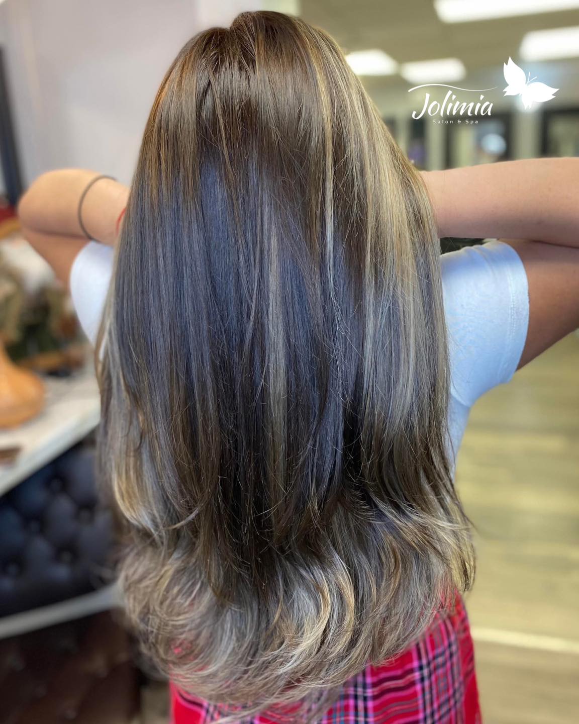 Glossy Long Layered Cut with Luminous Balayage