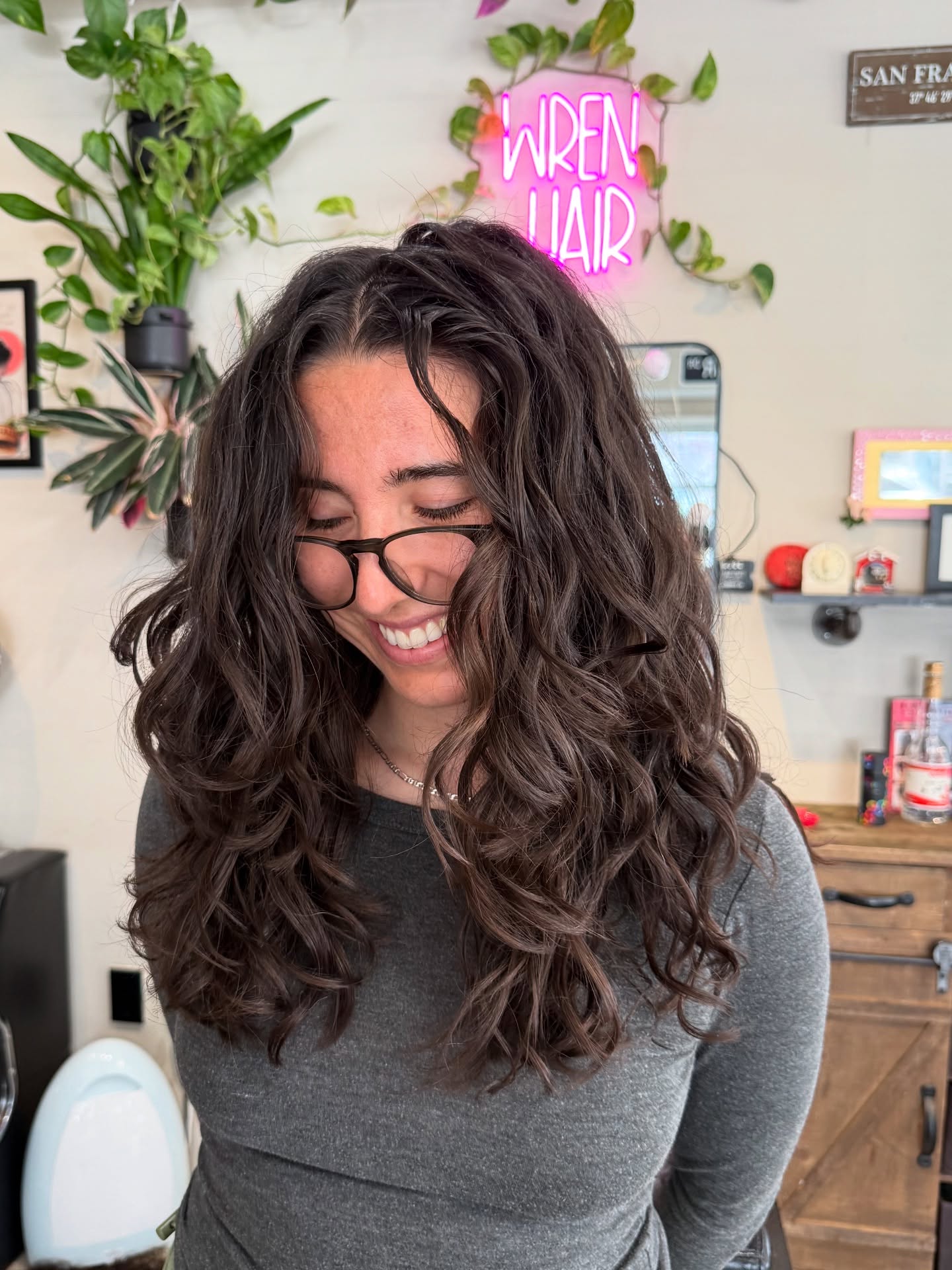 Lush Dark Brown Layered Waves with Subtle Center-Part Face Frames
