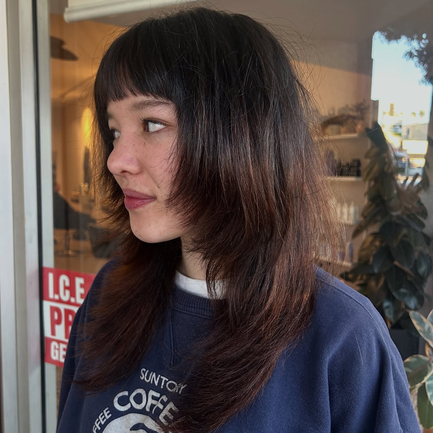 Mullet-Inspired Medium Shag with Blunt Micro-Bangs