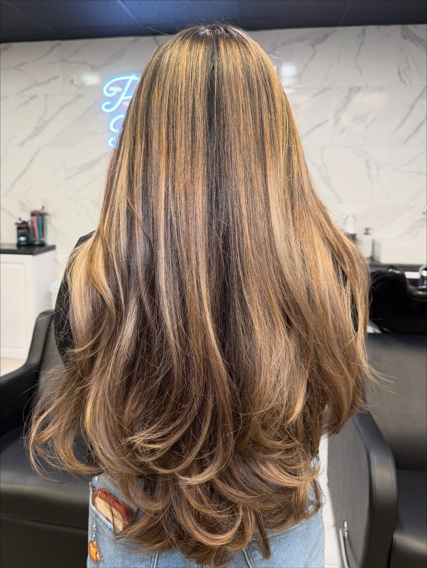 Radiant Long Layered Cut with Luminous Highlights