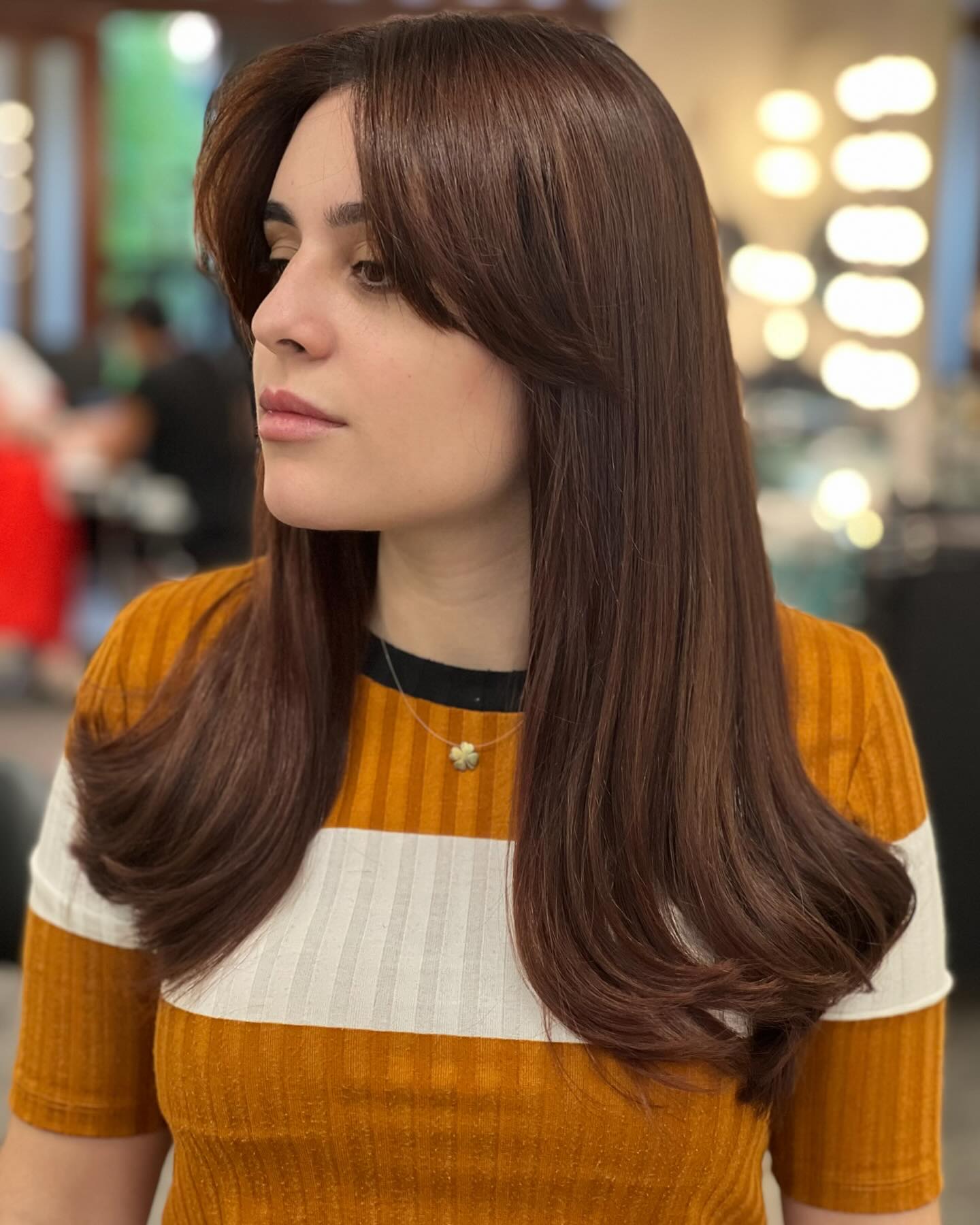 Radiant Long Layered Cut with Soft Face-Framing Bangs