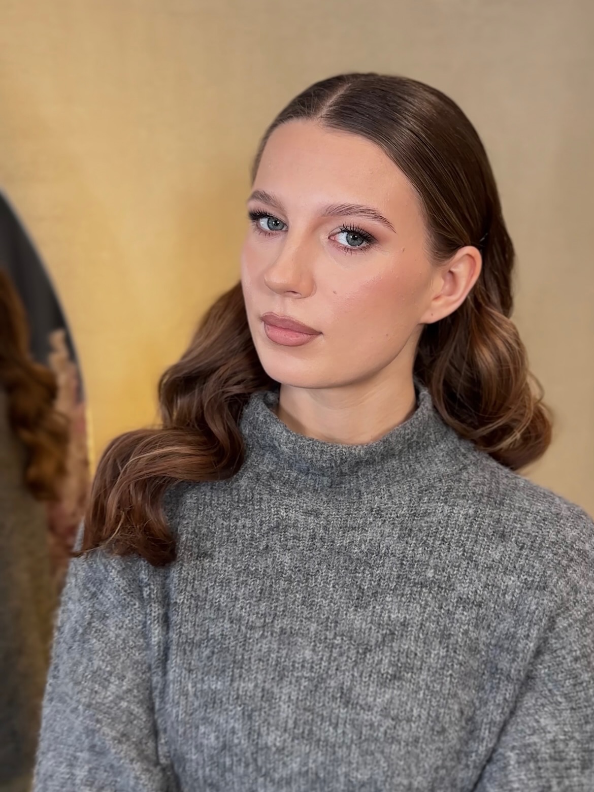 Sleek Center-Parted Sculpted Waves with Wrapped Rounded Ends