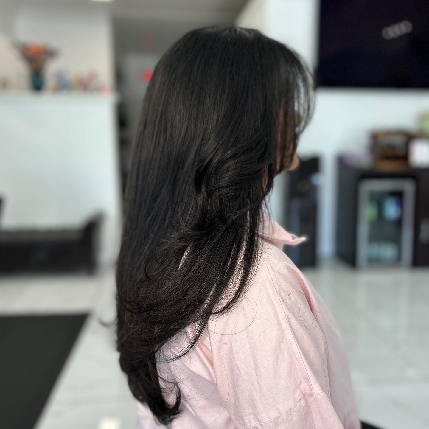 Sleek Long Layered Cut with Subtle Face-Framing Layers
