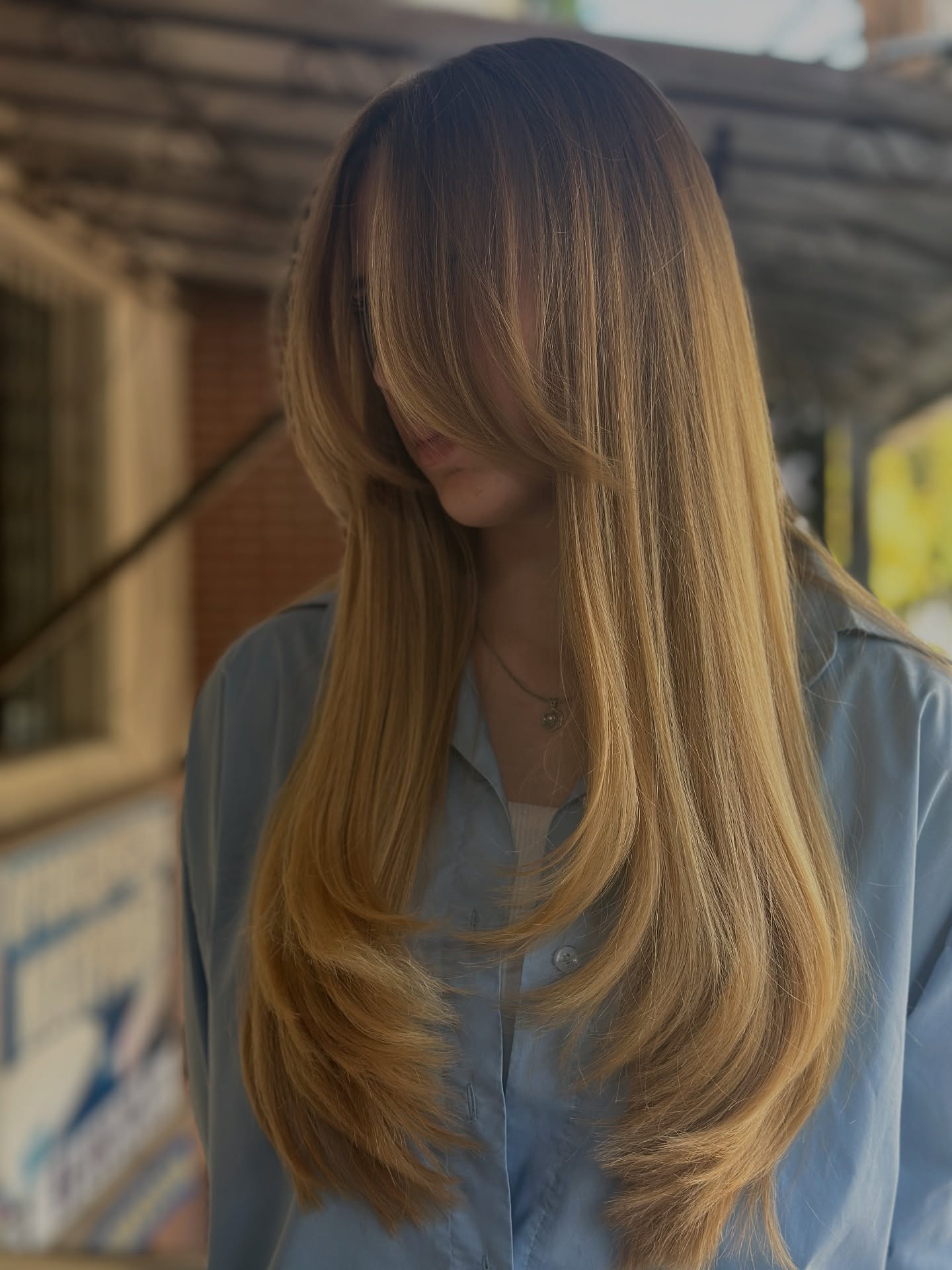 Stylish Long Layered Cut with Face-Cascading Layers