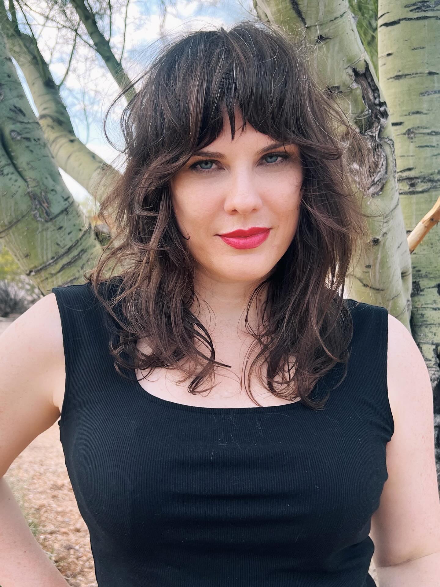 Textured Shoulder-Length Shag with Choppy Short Fringe