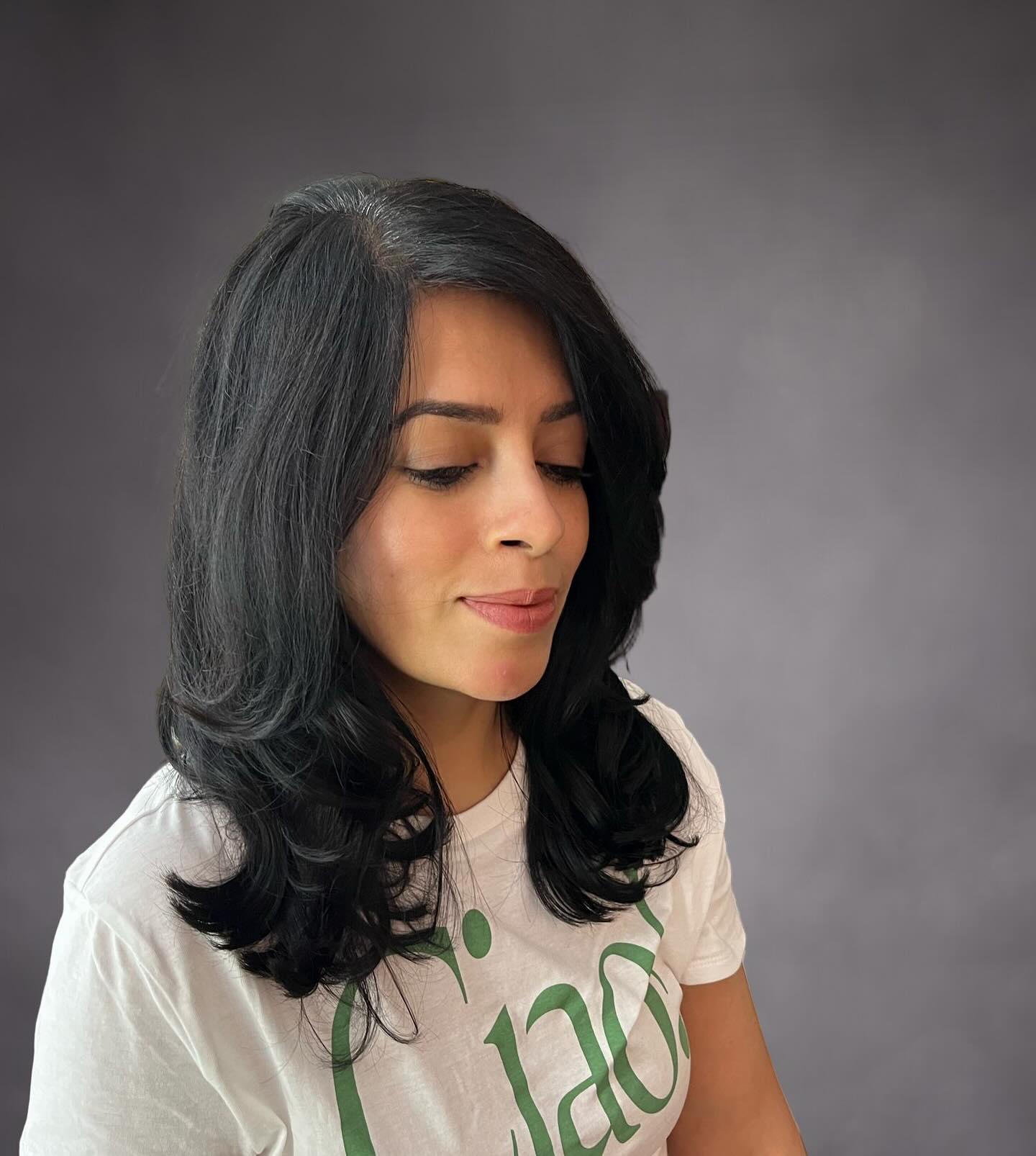 Black Shoulder-Length with Rounded Blowout Layers and Deep Side Sweep