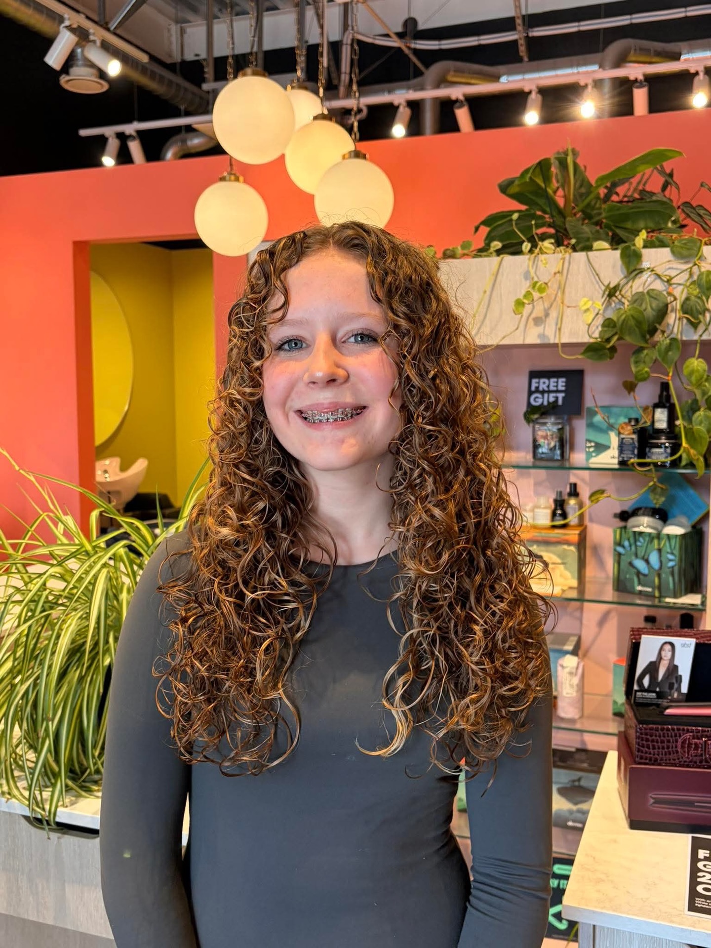 Chic Long Curly Layers with Soft Face-Framing Pieces