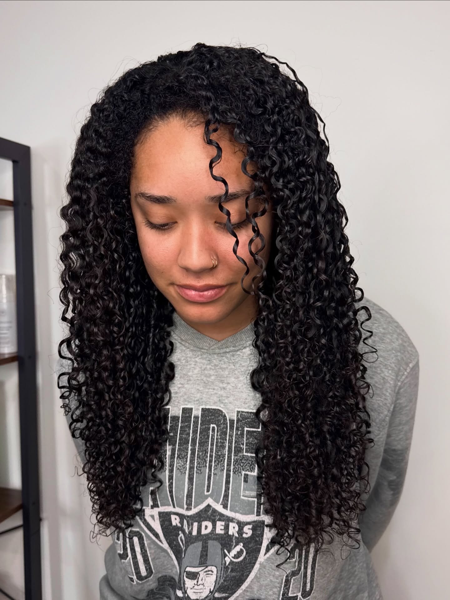 Defined Long Curly Layers with Natural Texture