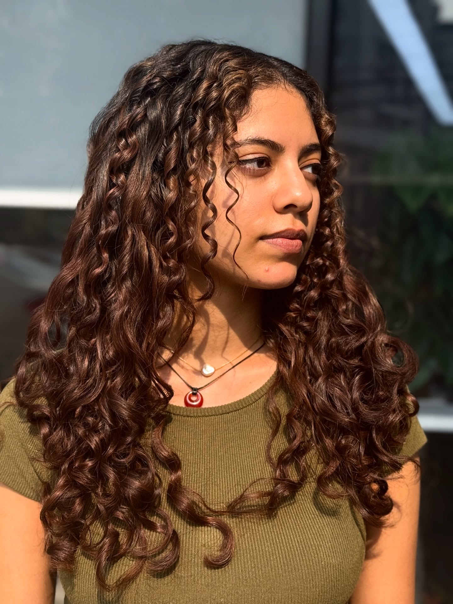 Defined Long Curly Layers with Rich Chocolate Tones