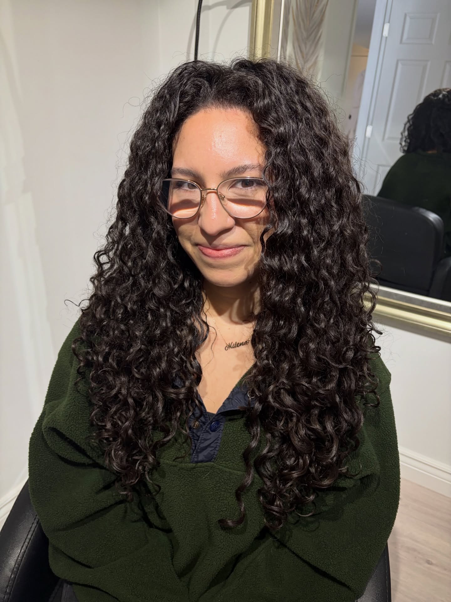 Dynamic Long Curly Cut with Defined Structure