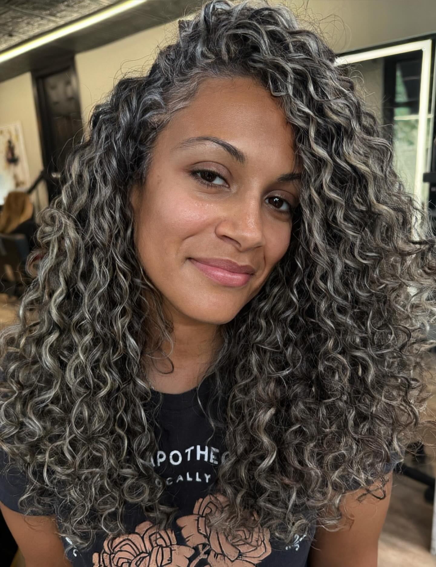 Dynamic Long Curly Layers with Silver Highlights