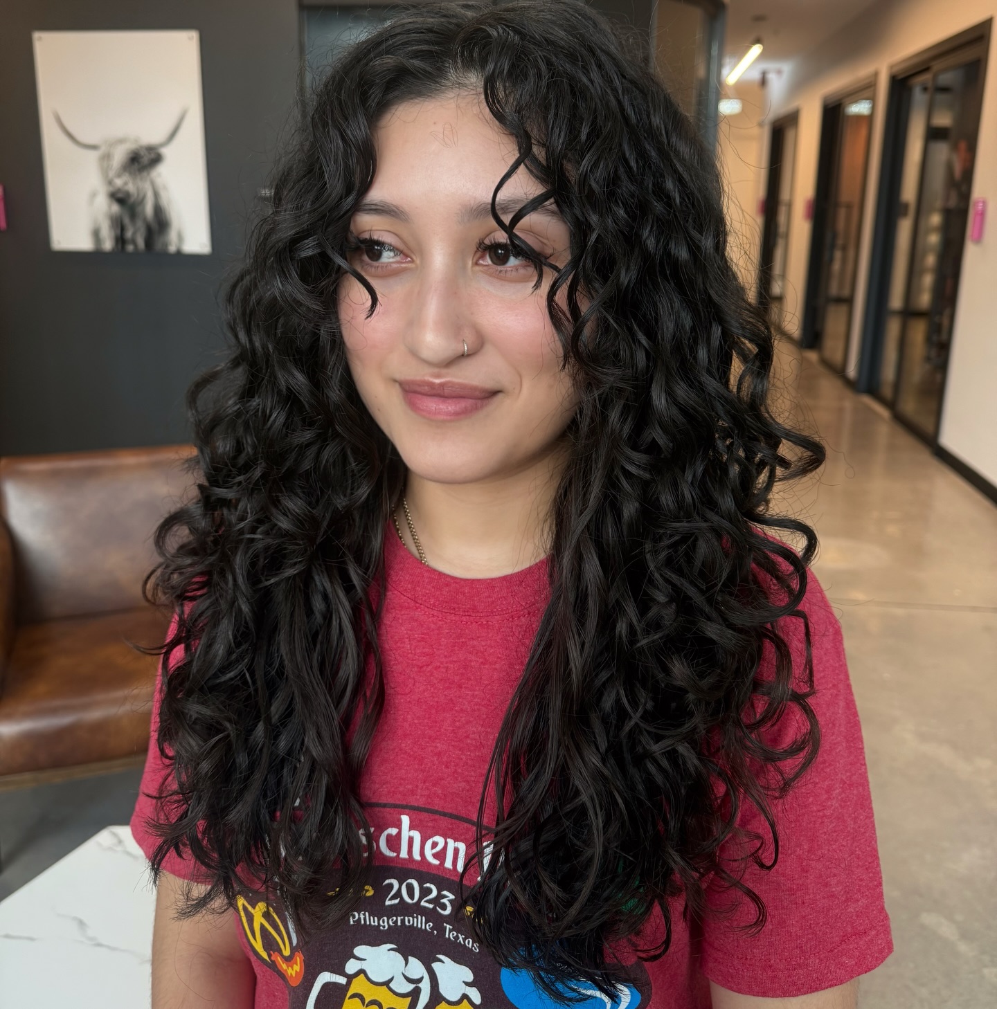 S-Shaped Long Curly Layers with Wispy Face-Framing Pieces