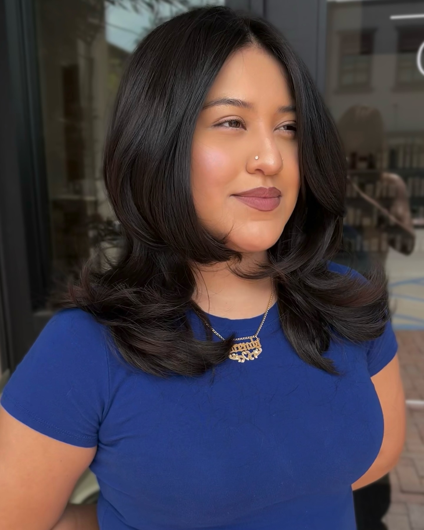 Sleek Mid-Length Cut with Soft Curled Ends