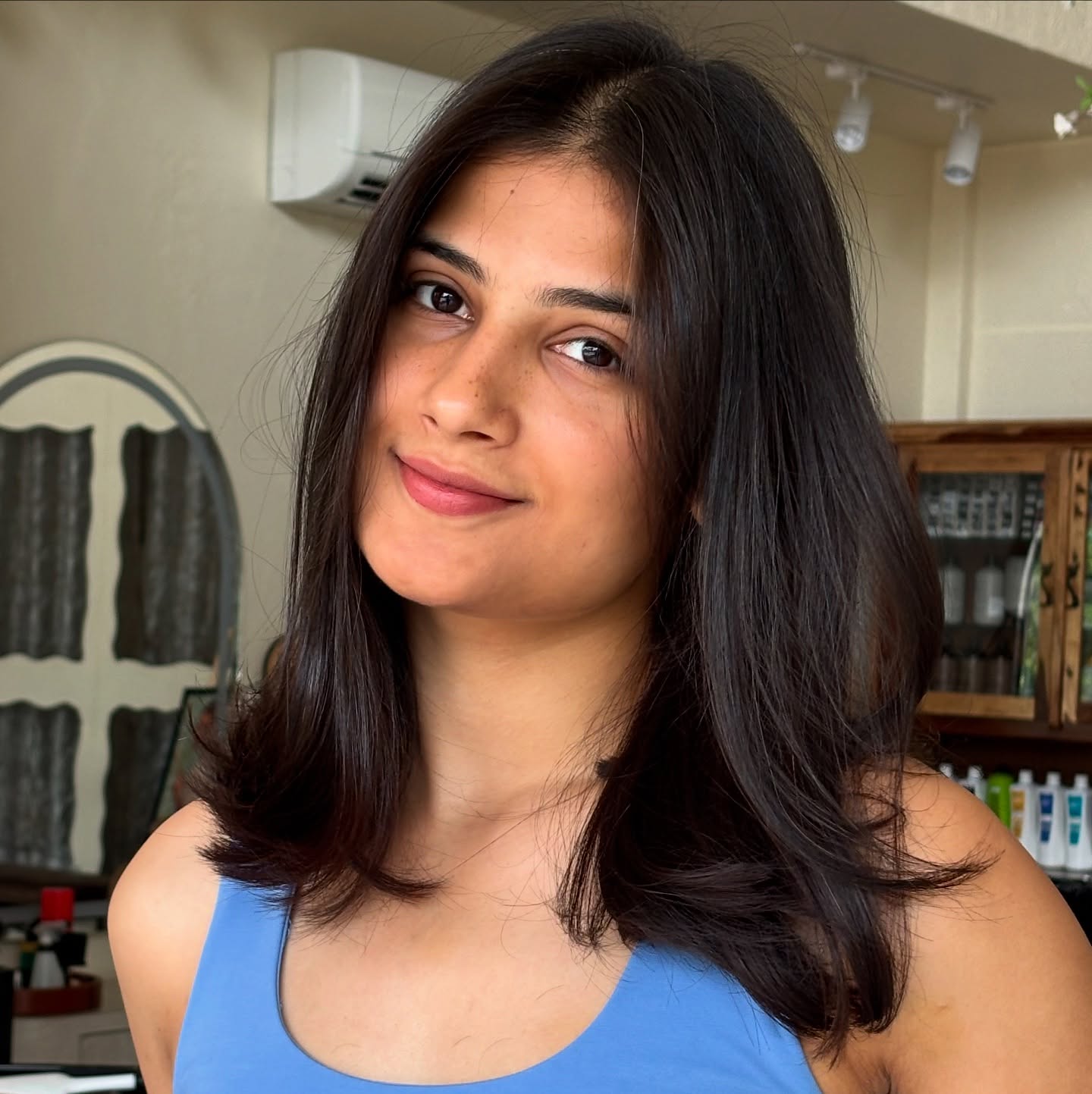 Sleek Mid-Length Cut with Subtle Layered Texture