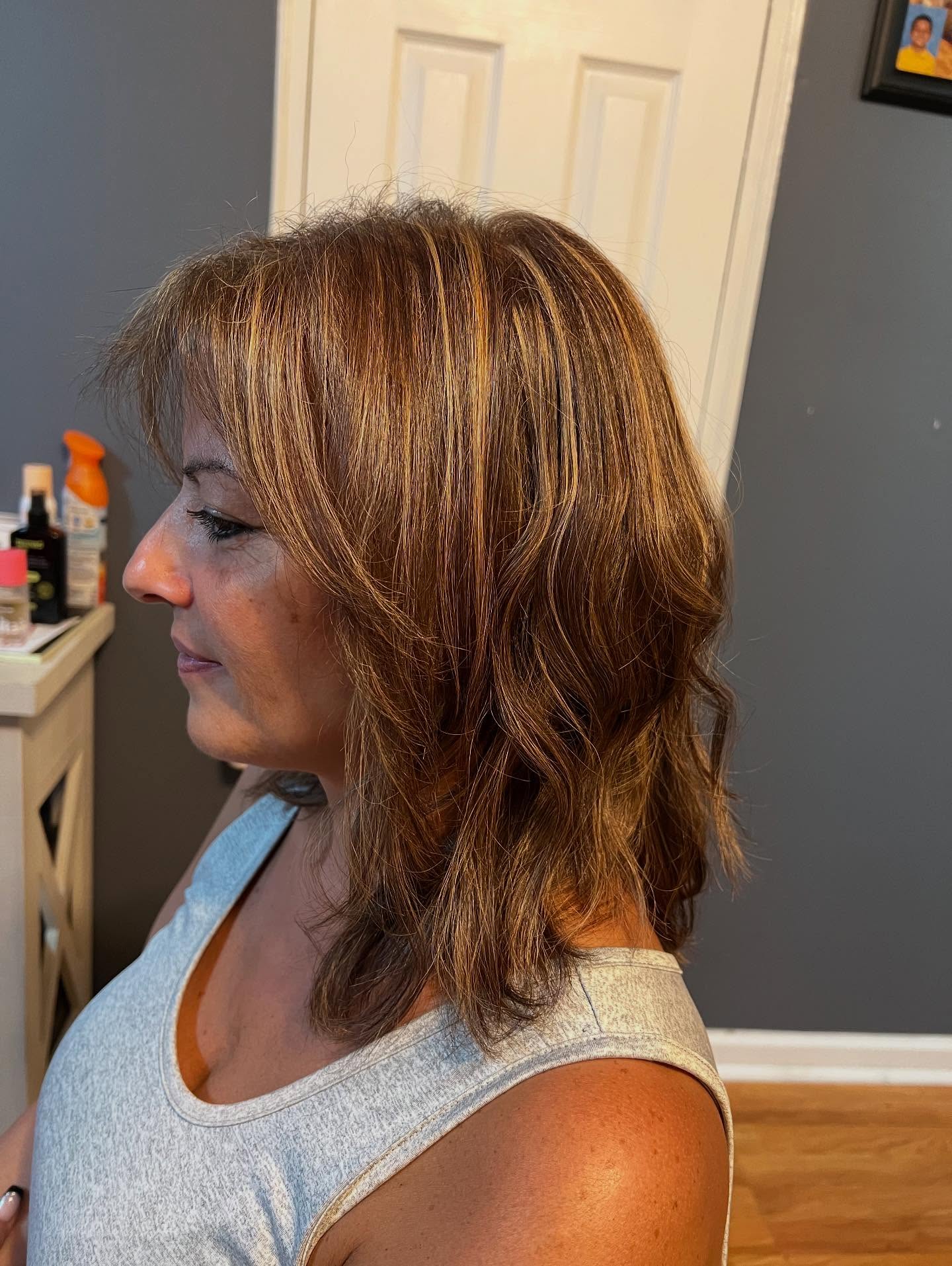 Soft Sunlit Caramel Shoulder-Length with Feathered Face-Framing Layers