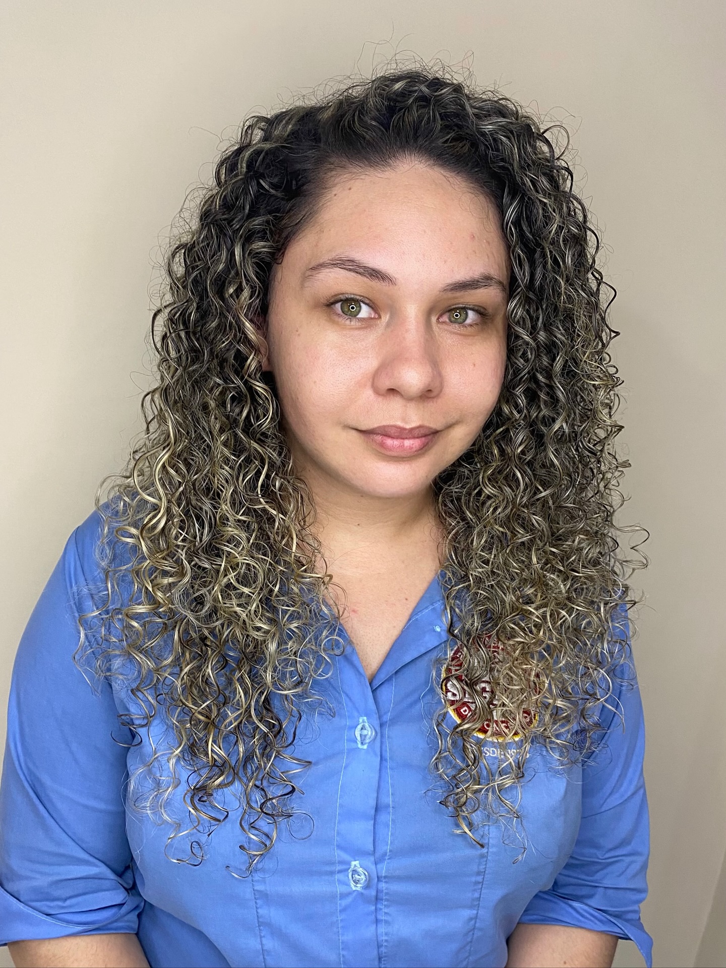 Textured Long Curly Cut with Subtle Highlights