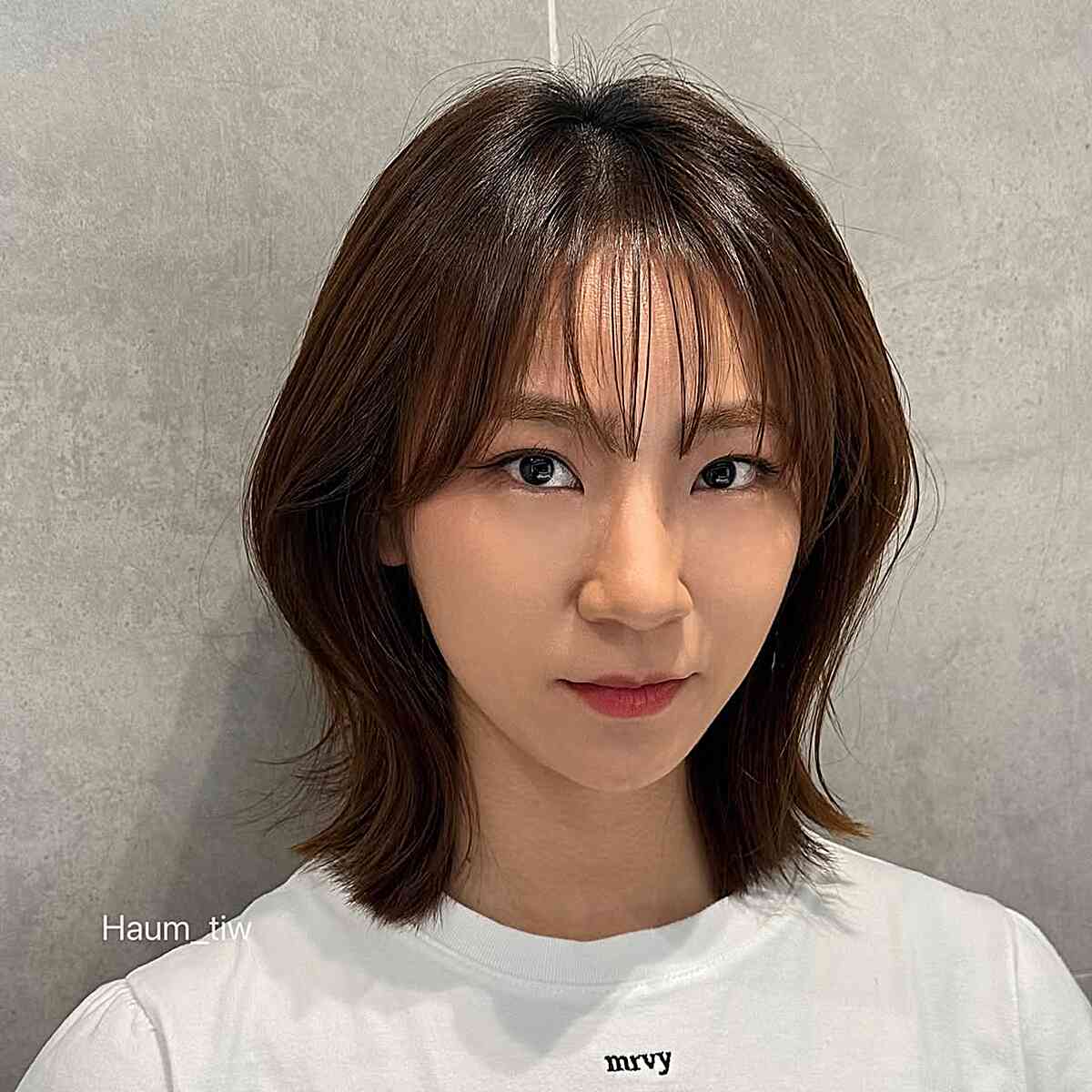 Textured Wispy Bangs with Shoulder-Length Layers