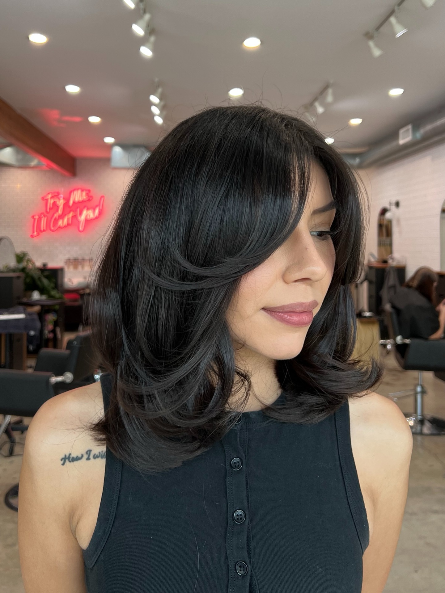 Voluminous Shoulder-Length Face-Framing Layers with Curtain Sweep